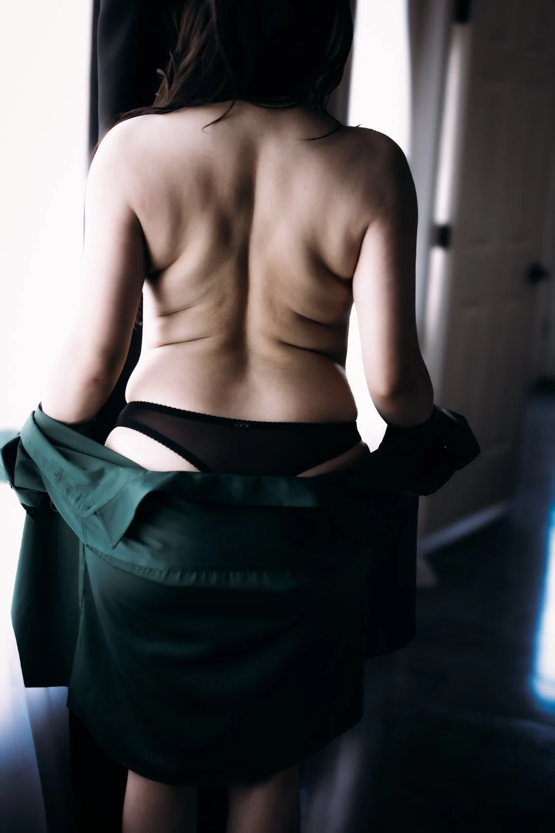 Back view boudoir portrait with silk shirt by photographer in Tucson, fine art boudoir photography