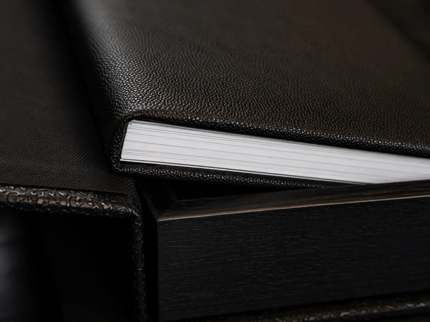 Luxury black leather boudoir album handcrafted for fine art photography clients in Tucson, Arizona.