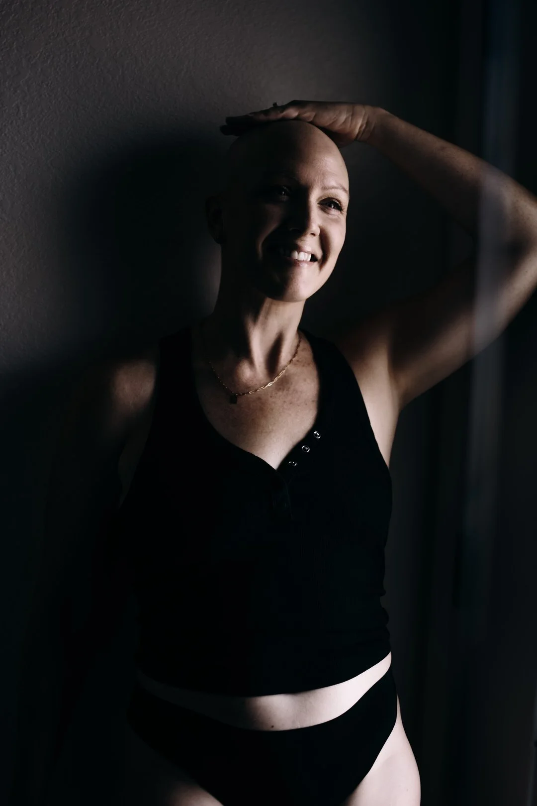 A breast cancer survivor portrait celebrating courage, healing, and transformation. Photographed in Tucson, Arizona by Rebekah Ayantola, this warrior portrait honors the strength required to face uncertainty and move forward with hope.