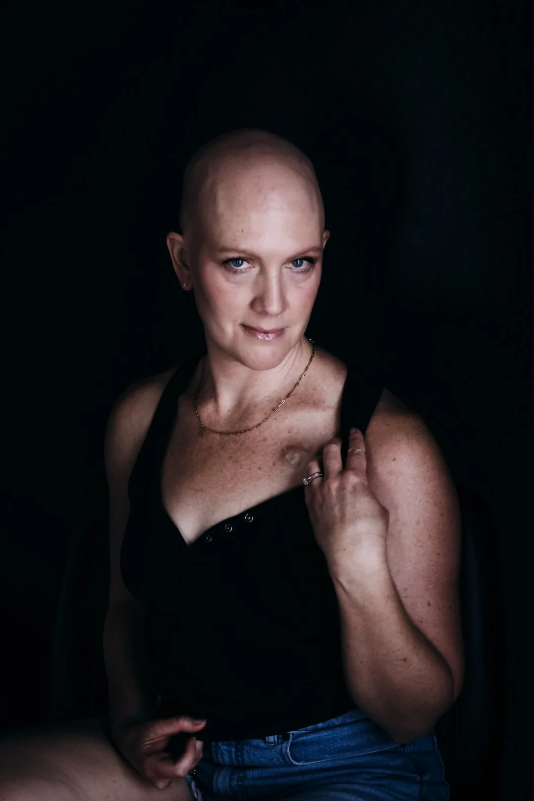 A portrait of hope and resilience celebrating the warrior spirit. Photographed by Tucson portrait photographer Rebekah Ayantola, this empowering session honors survivors, fighters, and women whose strength inspires others.