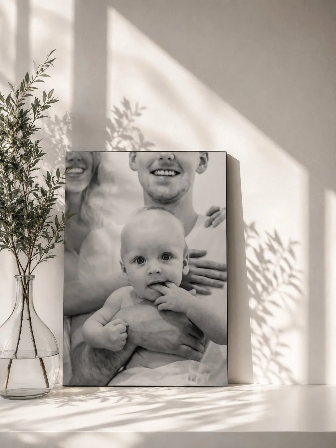 Black and white newborn photography displayed as framed wall art by Tucson family photographer Rebekah Ayantola.