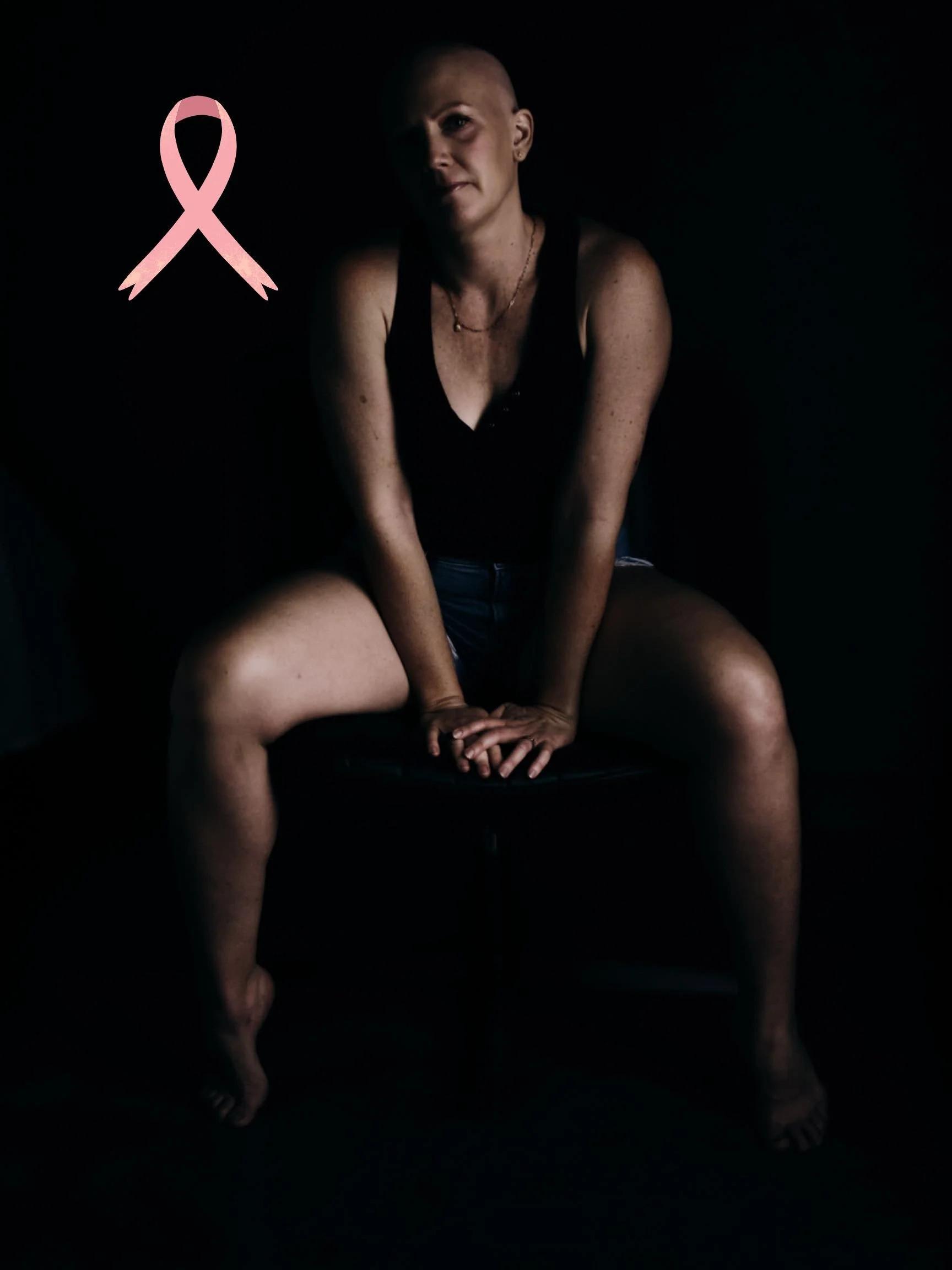 Warrior portrait with breast cancer ribbon, celebrating female strength by luxury photographer in Tucson
