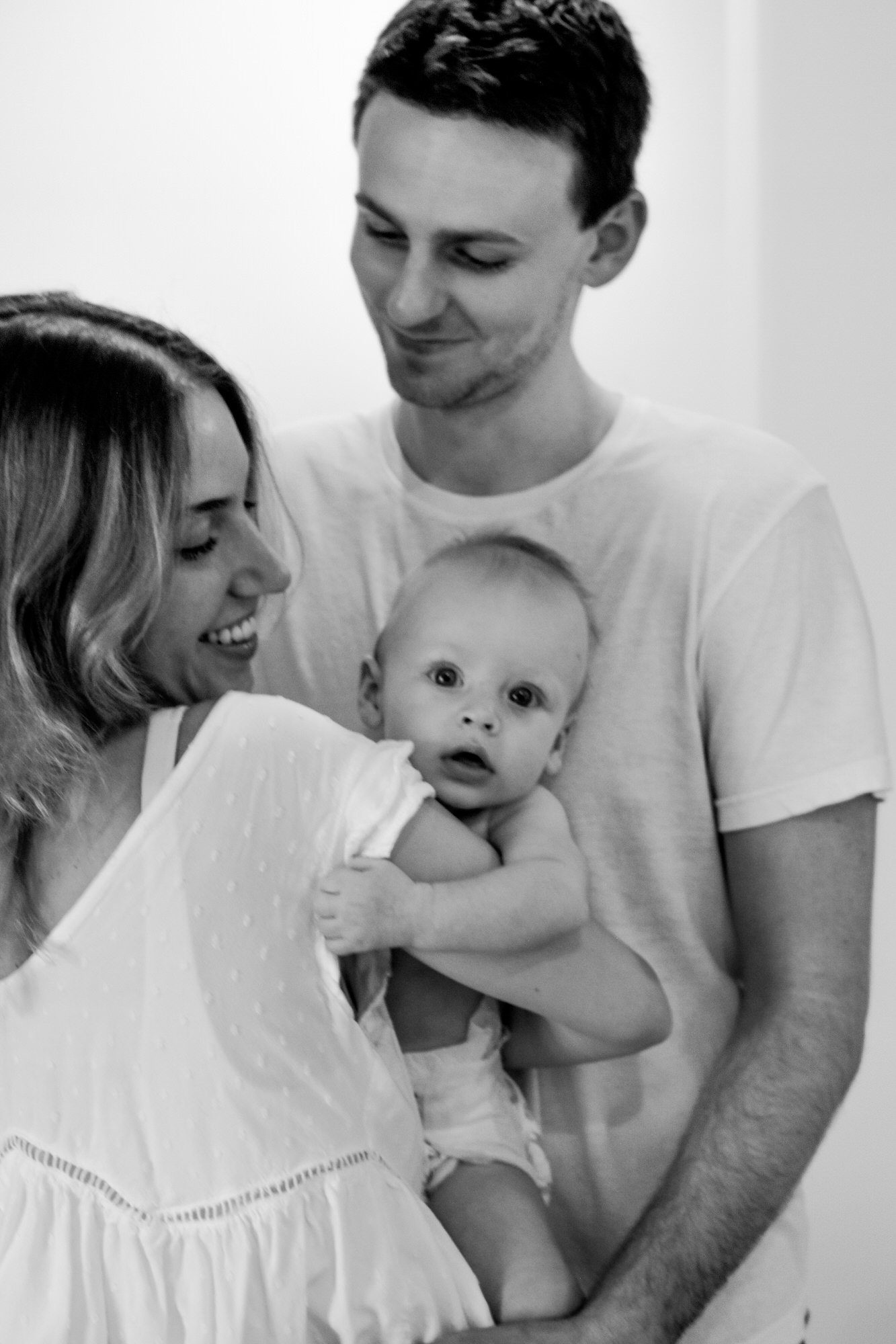 Fine art newborn photography displayed in a modern home by Tucson, Arizona family photographer Rebekah Ayantola.