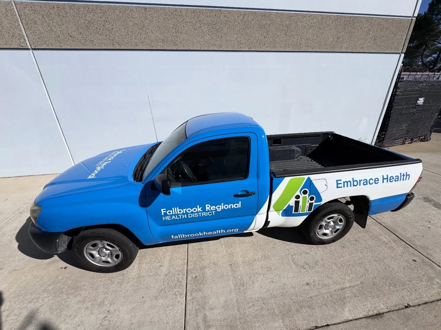 From concept to completion.  Check out the before, work in progress &amp; after photos.
 We designed, printed, and installed this full truck wrap for Fallbrook Regional Health District, giving them a clean, professional, and high-impact mobile presen