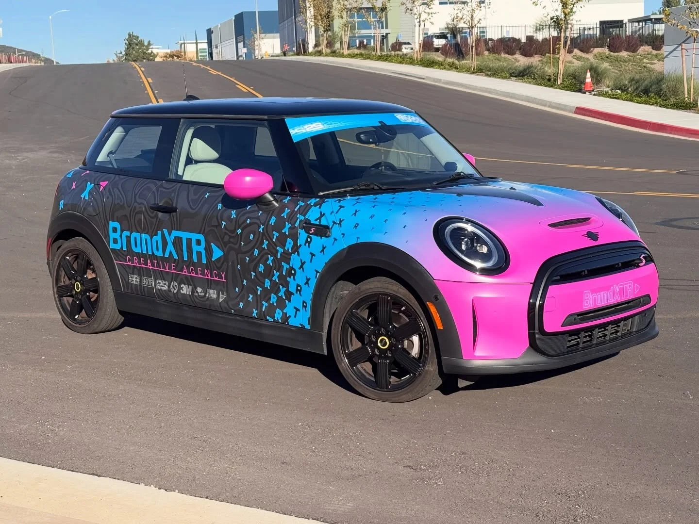Our new demo wrap is live and rolling. Designed, produced, and installed 100% in-house here at BrandXTR &mdash; because that&rsquo;s what sets us apart. This Mini Cooper is wrapped top to bottom in full color, showcasing the same level of detail, cre
