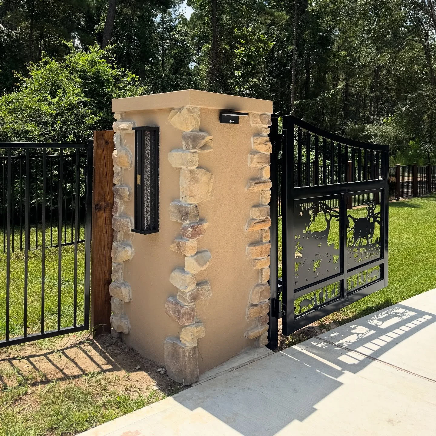 Strength meets style. 🚪✨ From custom stone columns to detailed steel gate designs, we build entrances that make a statement. Call us today for a FREE quote! 📞 #FencesByCraig #CurbAppeal #CustomGates