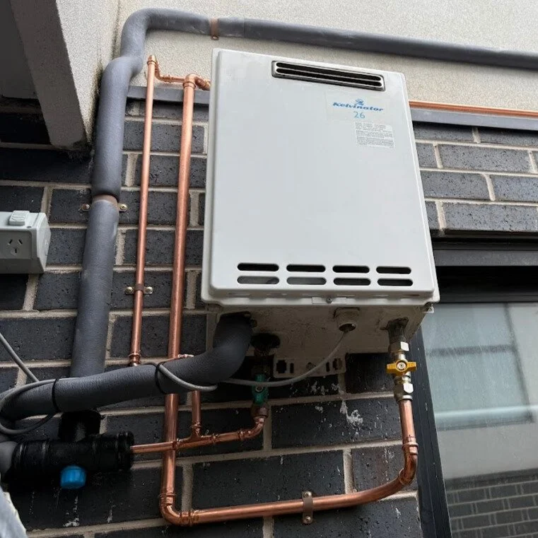 Hot water system on an outside wall