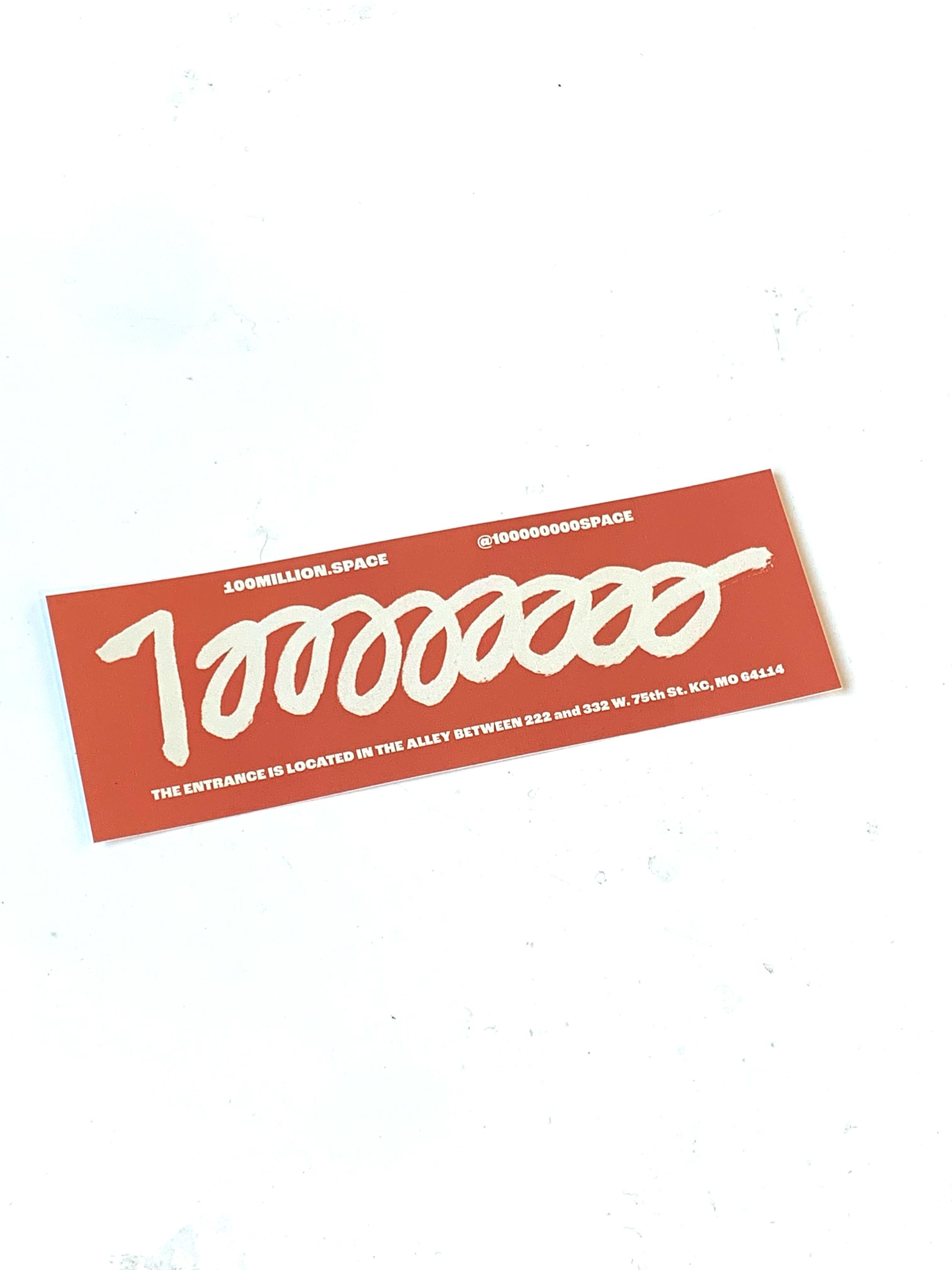 100m sticker.jpg