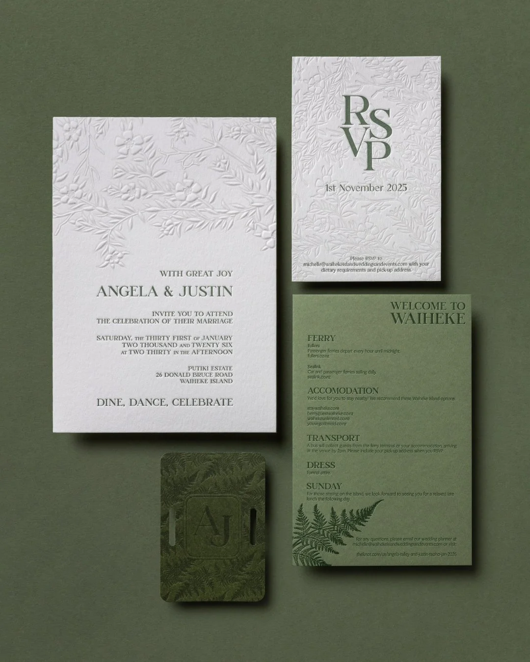 Custom letterpress wedding invitation suite with embossed botanical details, RSVP card and green wedding information cards.