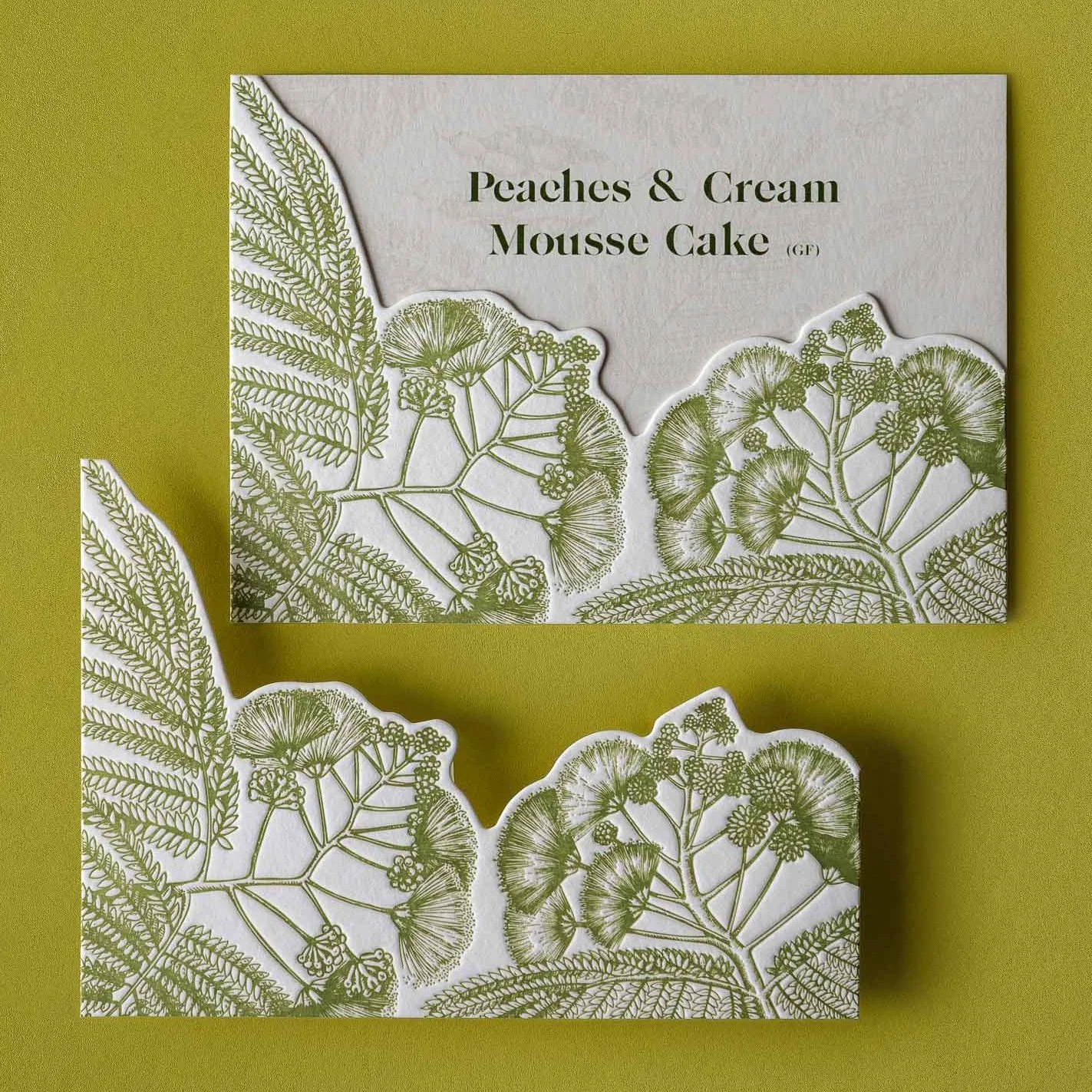 Greer and Cohen’s die-cut wedding dessert cards featuring letterpress silk tree flower illustrations on textured cotton card.
