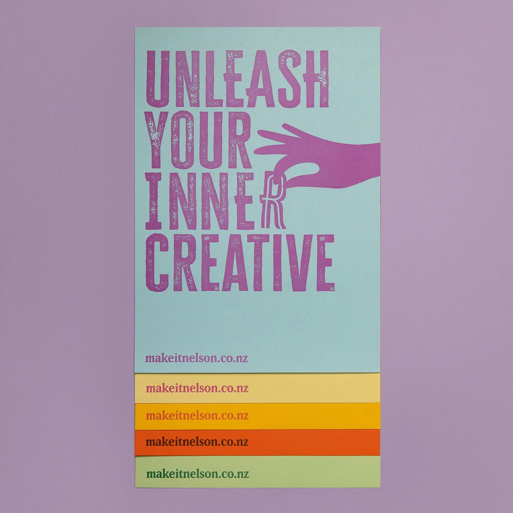 Make It Nelson letterpress posters printed in pink ink on blue, yellow, orange and green card.