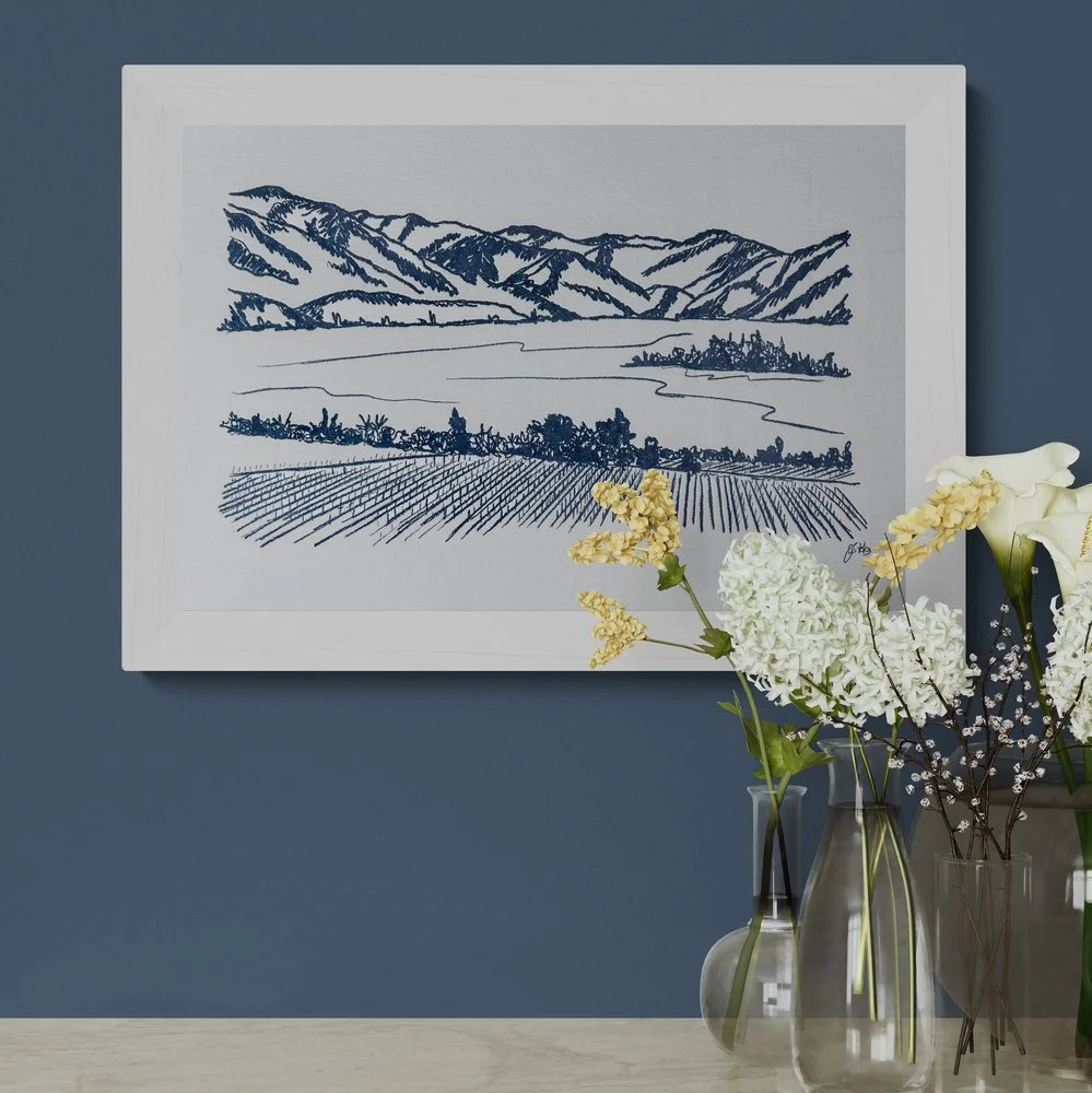 Framed limited edition letterpress artwork featuring a hand-drawn illustration of the Rippon vineyard landscape in Wānaka.