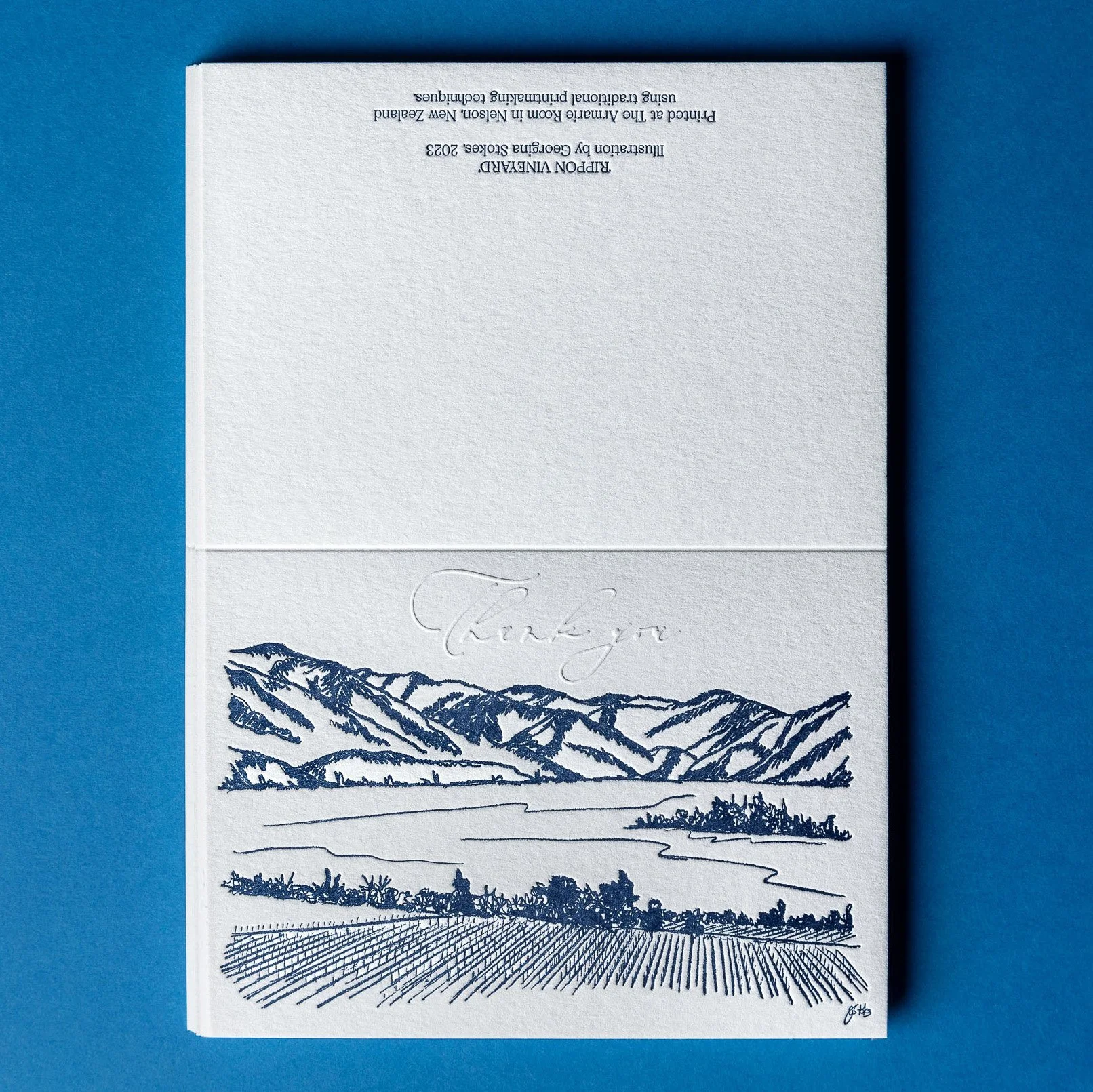 Front and back of a letterpress thank you card featuring blind embossed "Thank you" lettering and a hand-drawn Rippon vineyard landscape illustration.