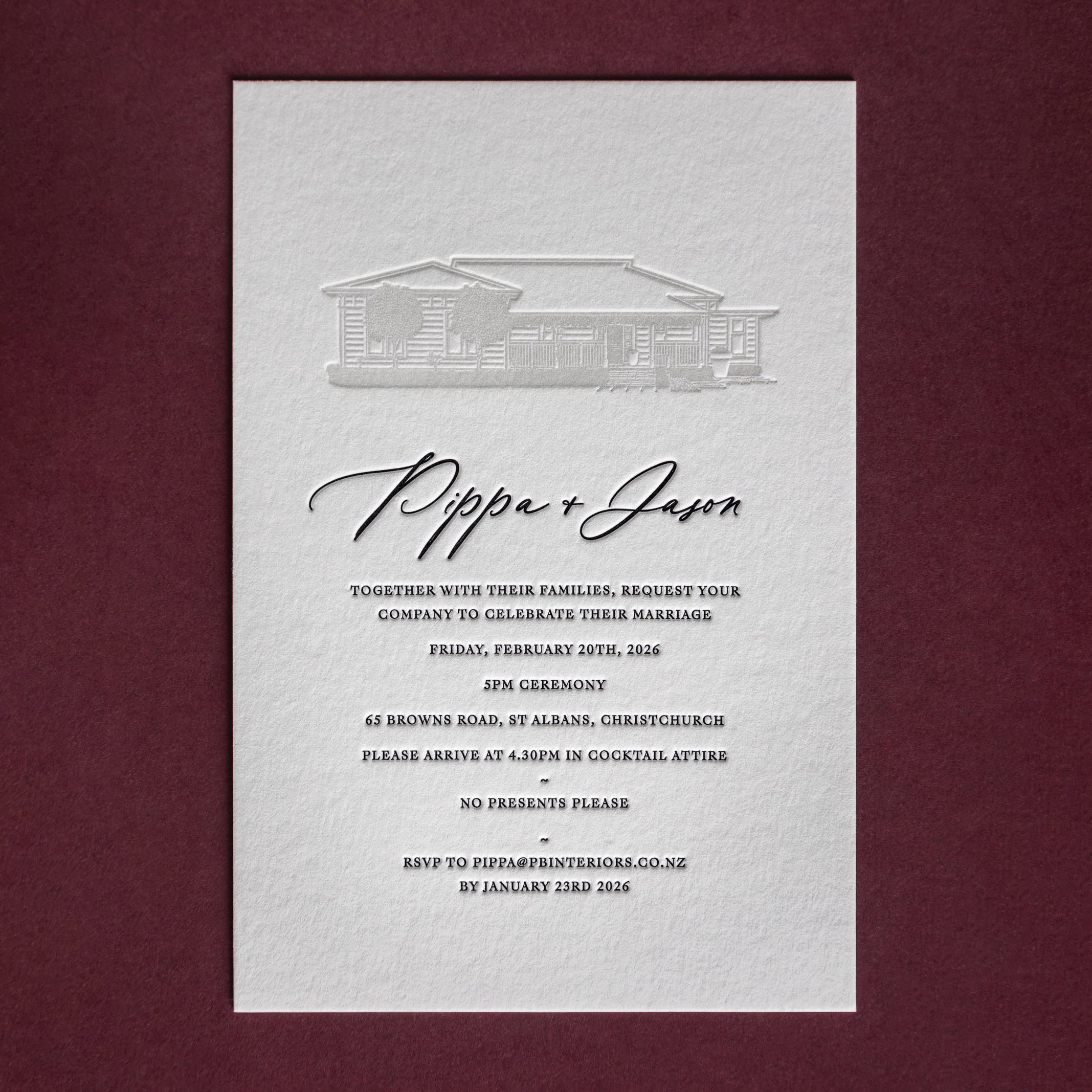 Letterpress wedding invitation featuring a refined architectural illustration of the couple's home, printed in soft grey ink with black typography.