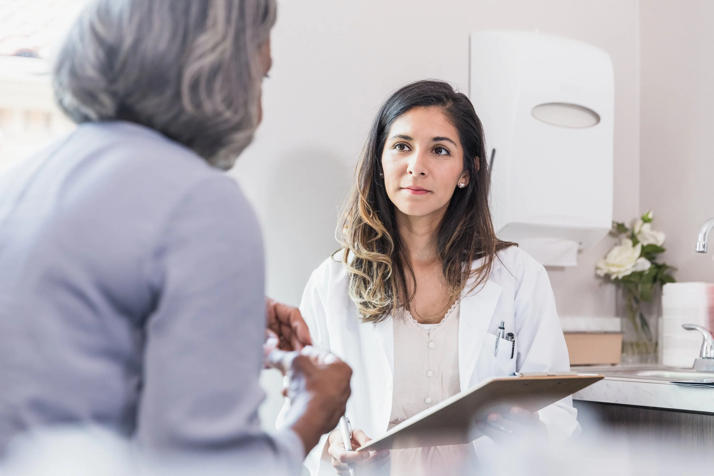 Doctor and patient in consultation on DFU