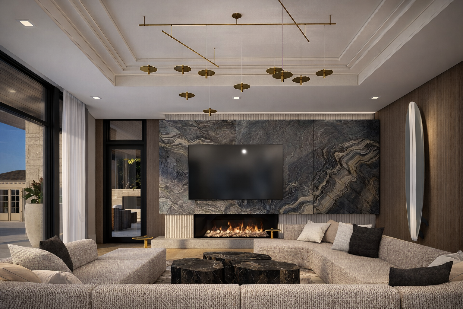 Modern living room with a curved sectional sofa, three black marble coffee tables, a fireplace, and a large mounted flat-screen TV on a marble accent wall. Gold ceiling decor and a large potted plant near sliding glass doors.