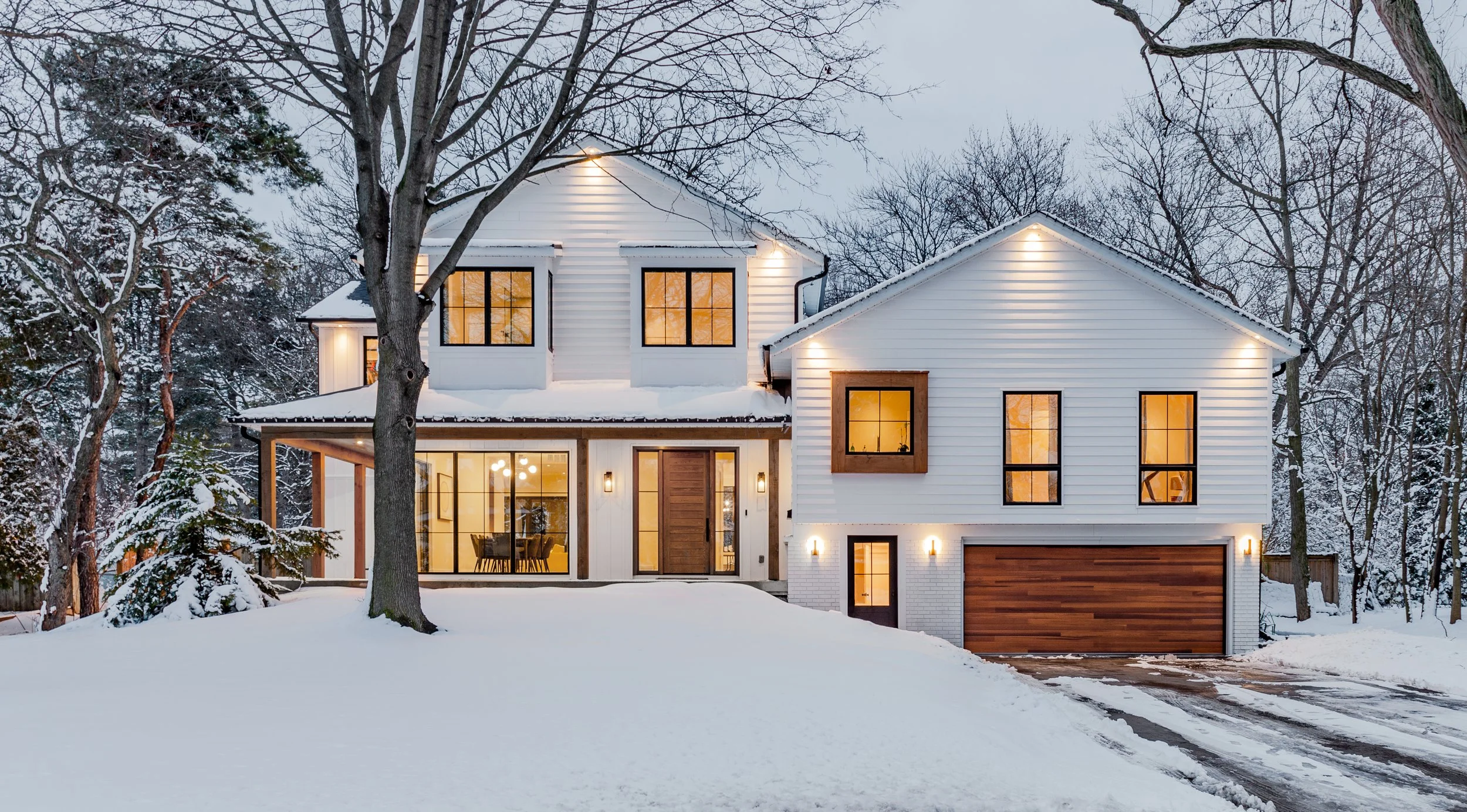 Luxury new build home in Burlington by architecture firm, featuring modern design, premium materials and a refined custom residential exterior