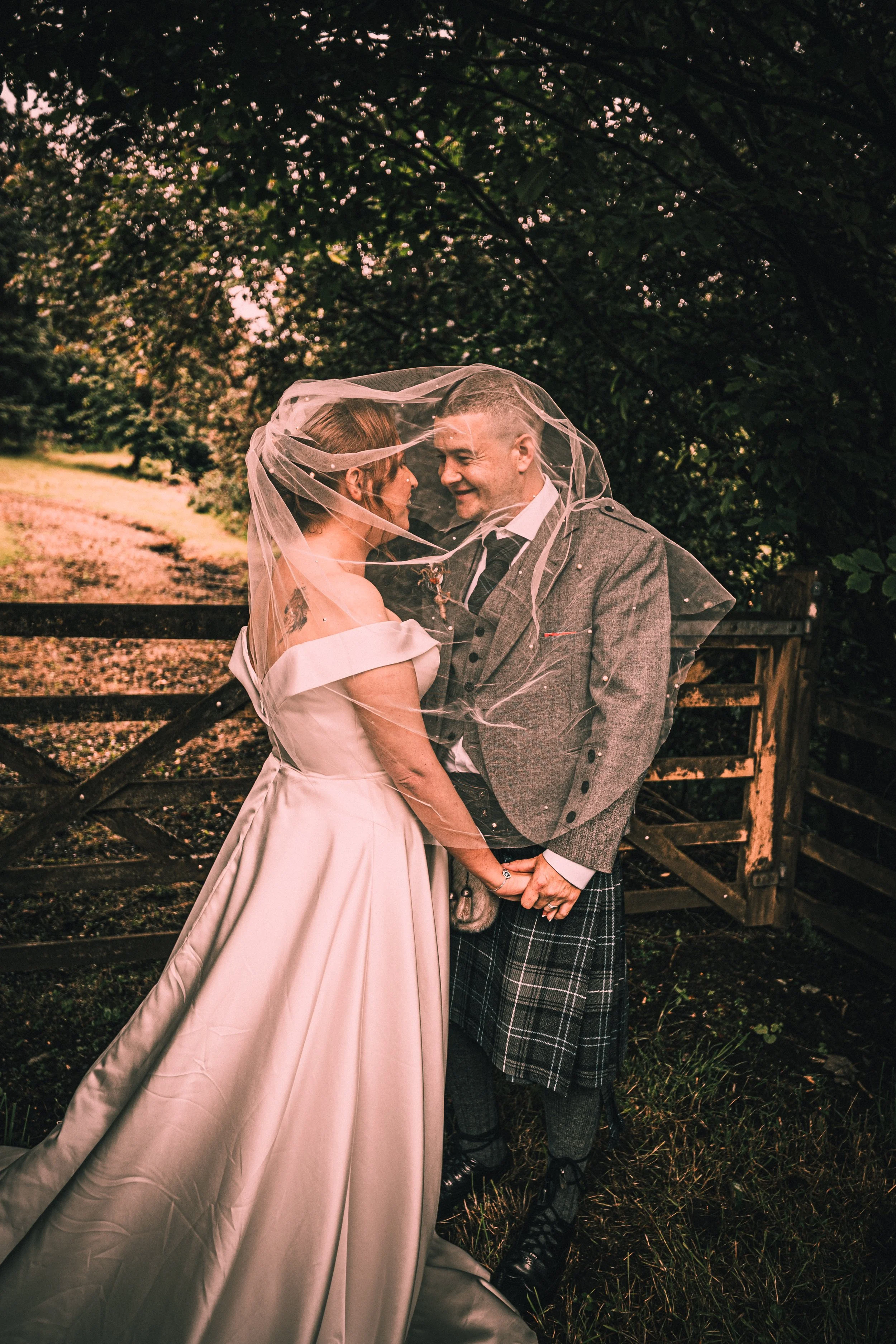 Gary and Chelsea at the kissing gate Bowfield.jpg