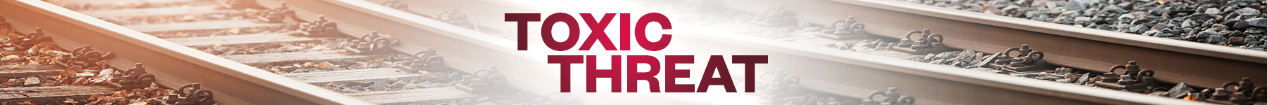 Close-up of railroad tracks with the words 'Toxic Threat' overlaid in bold red and black text.