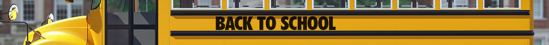 Close-up of a yellow school bus with a sign that says 'Back to School' on the side.