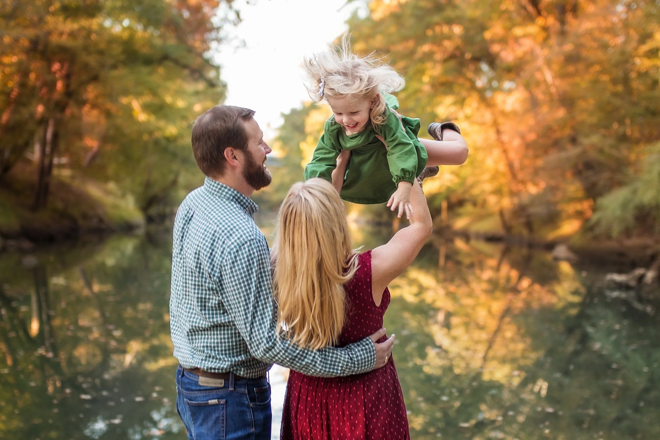 Family Portrait standing by the river