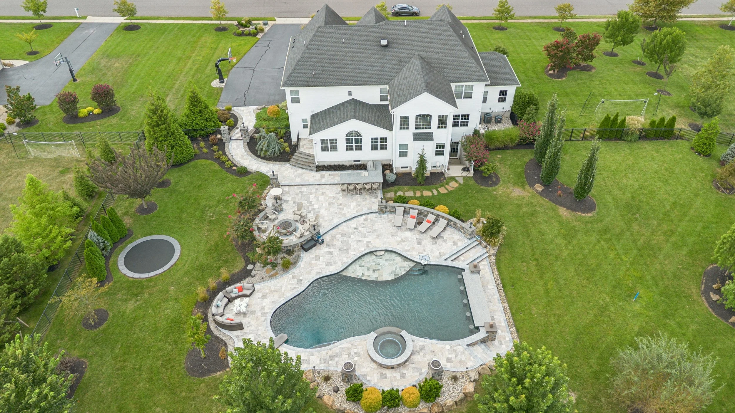 Saltwater Pool with travertine hardscaping in Mullica Hill NJ