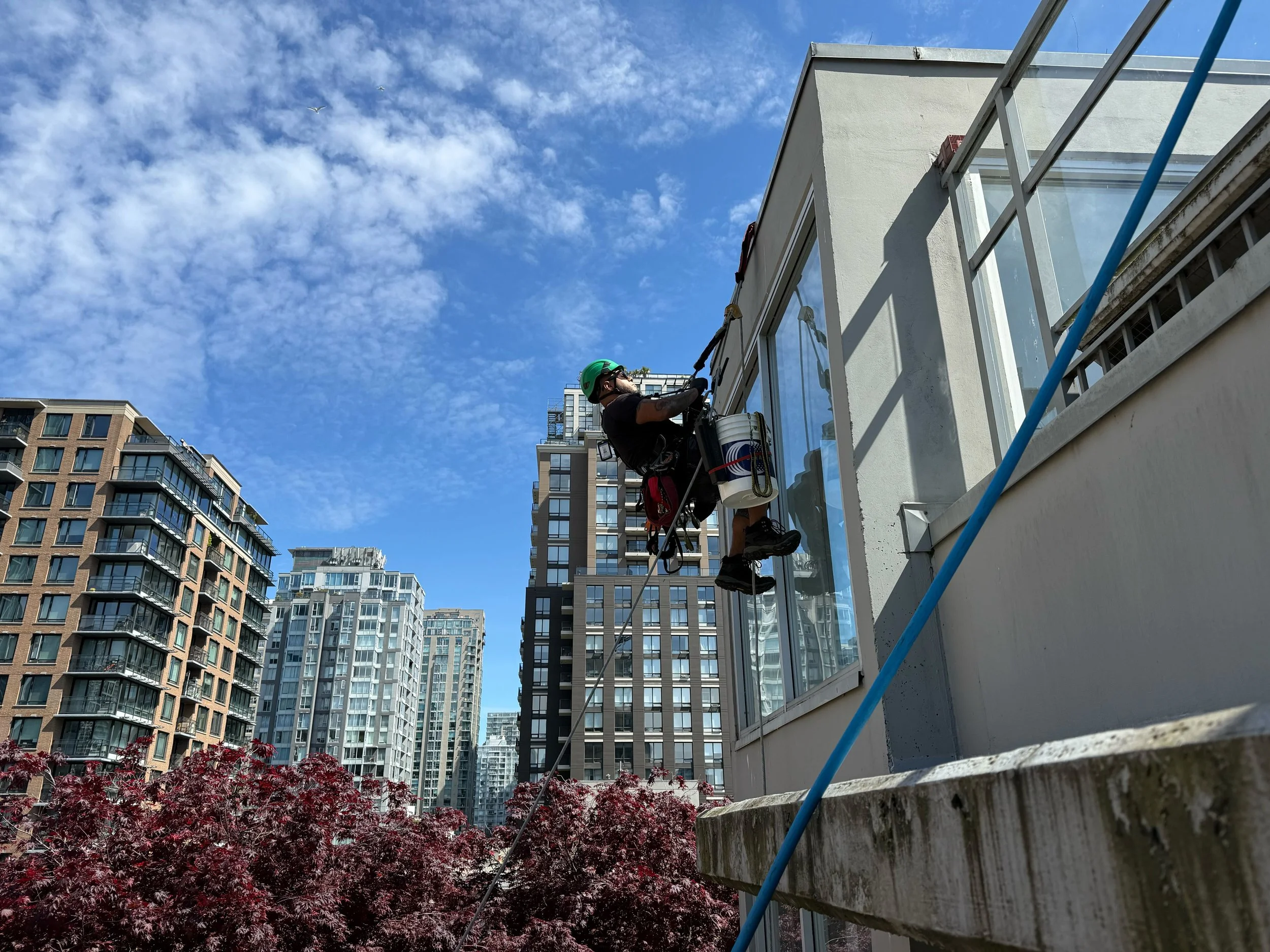 Rope access power washing building facade and exterior siding BC