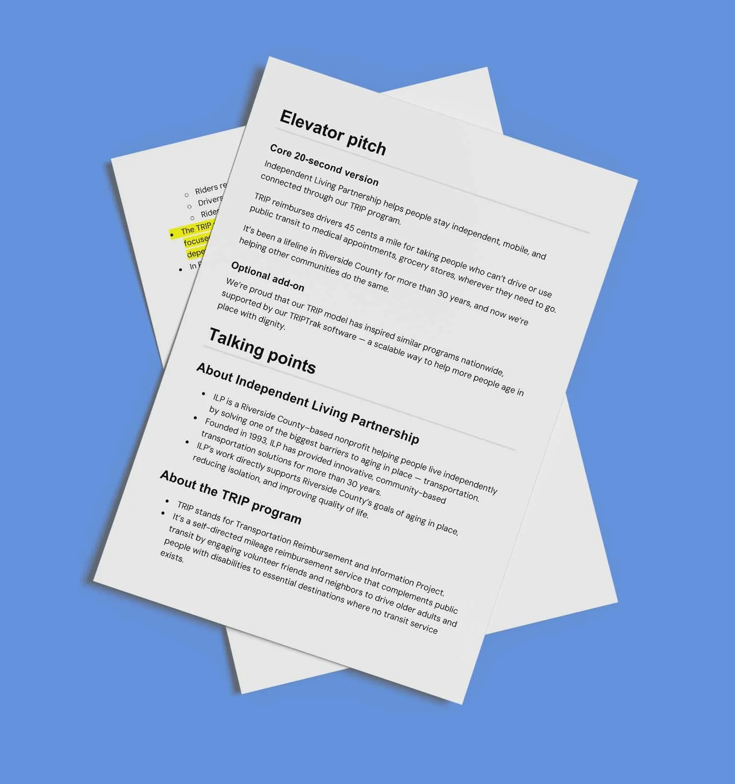 Elevator pitch documents laying on a blue background