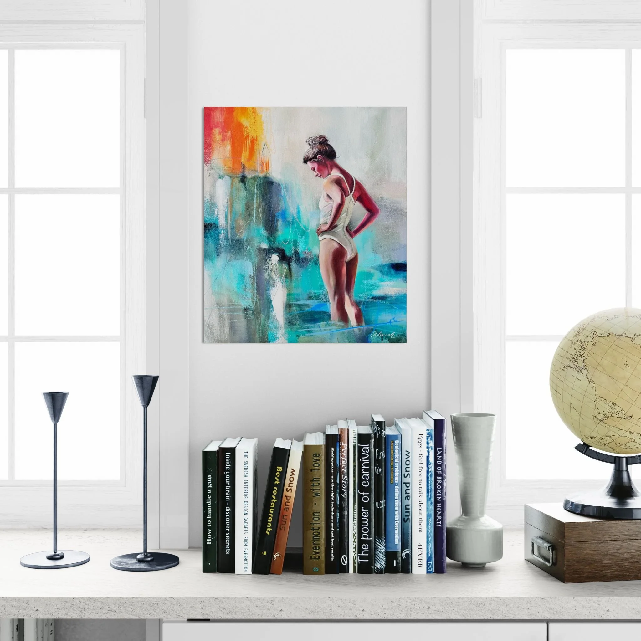 Close-up of a shelf with books and a globe.jpeg
