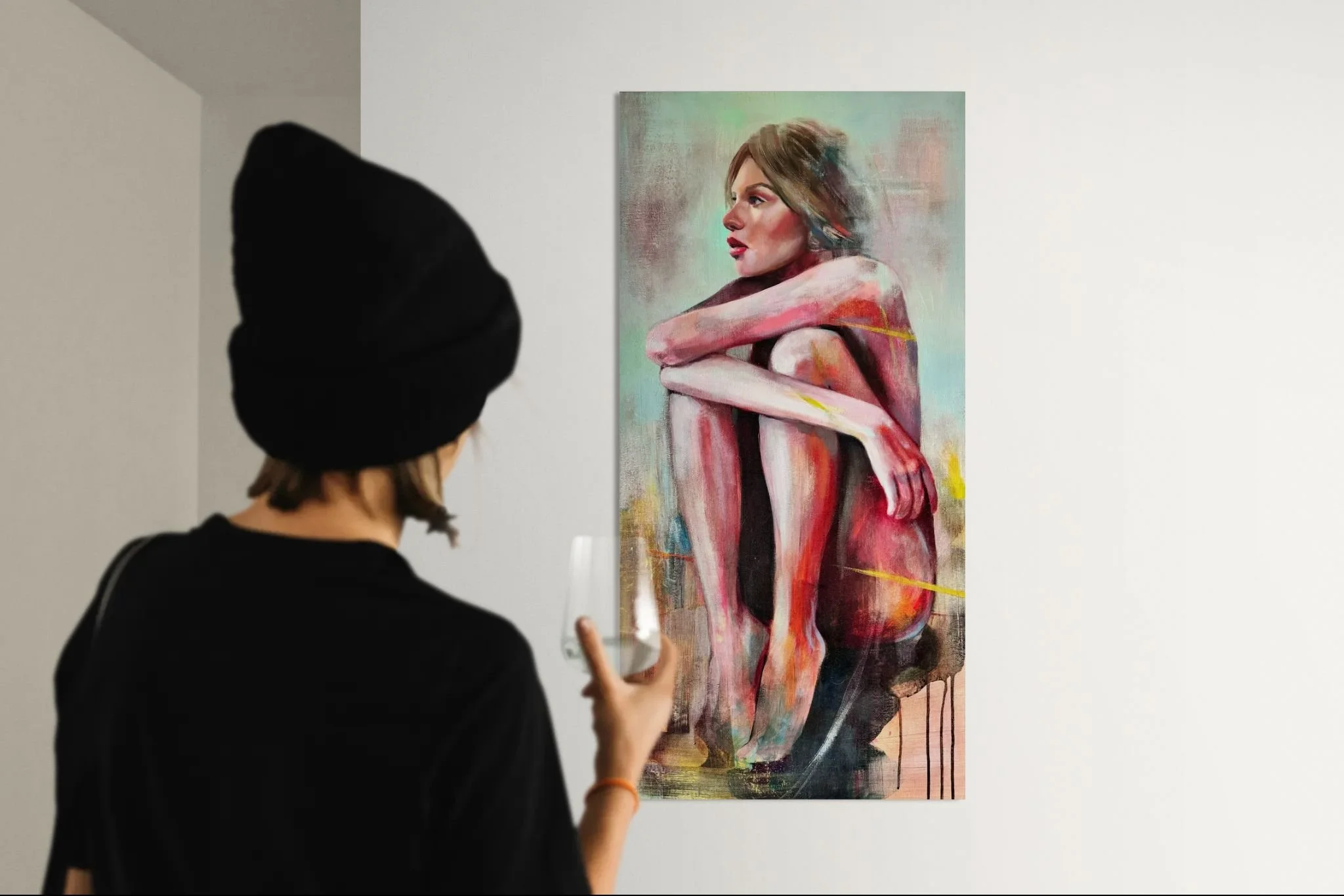 Close-up of a woman next to a gallery wall.jpeg