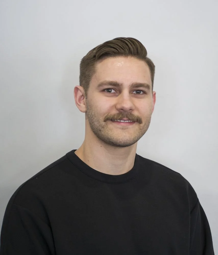 Headshot of staff member and personal trainer Jake Kluge.