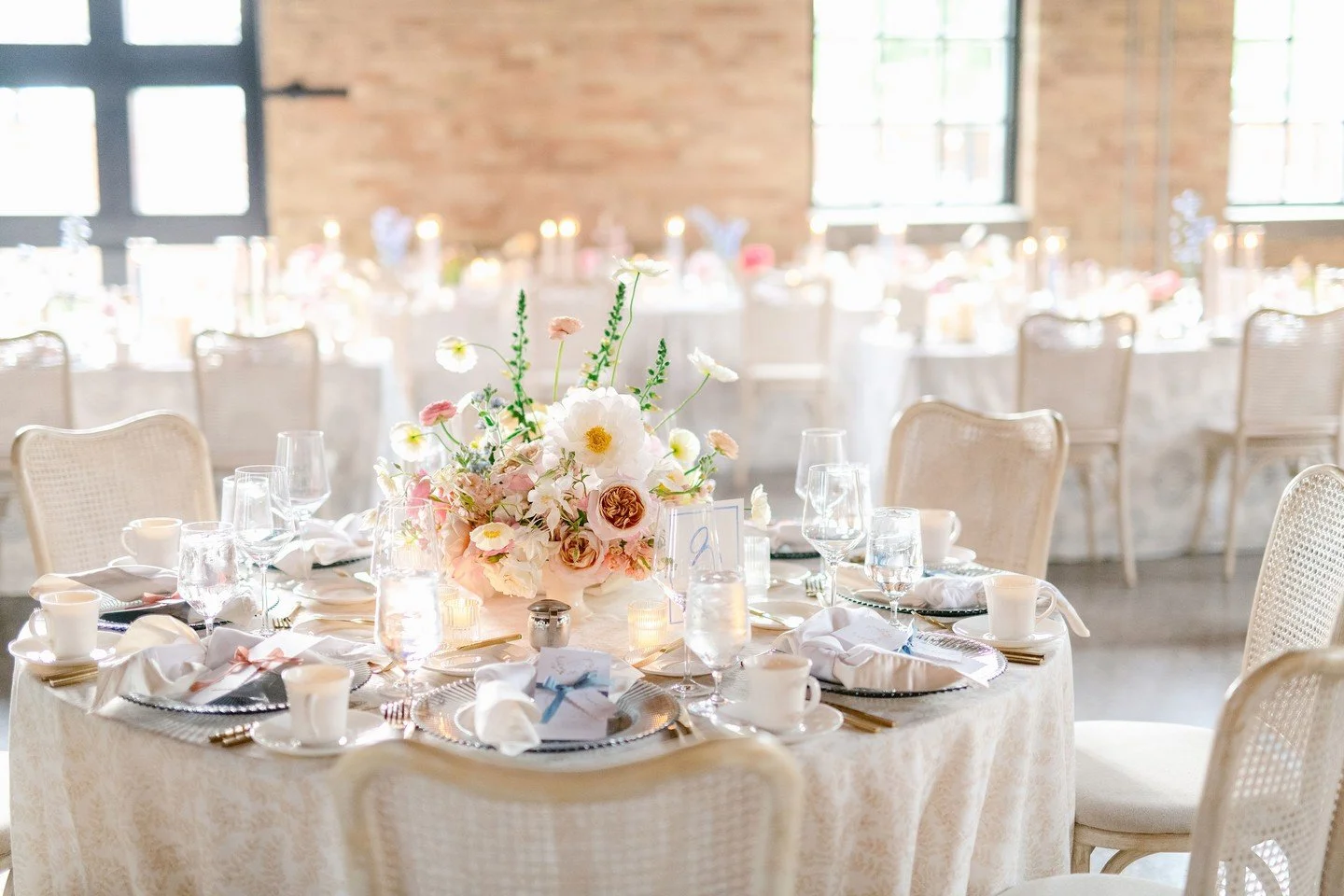 Layers on layers of beauty!⁠ Chargers, gold flatware, calligraphed menus, and elevated glassware created a look that was both refined and inviting, proof that a full table doesn&rsquo;t mean cluttered, it means curated.⁠
⁠
Reception Venue | @theessen