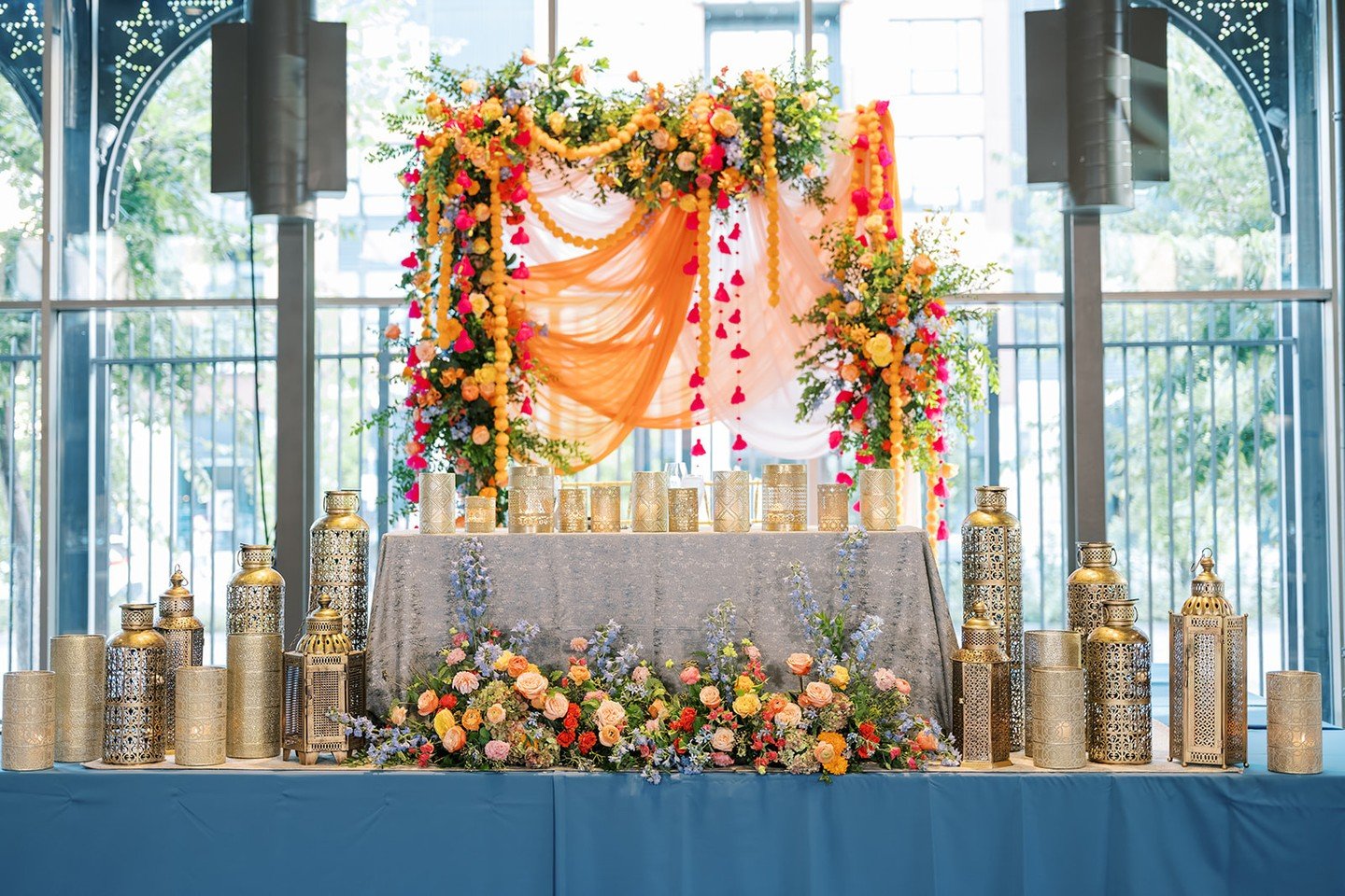 This focal point had a purpose! Placing this vibrant installation behind the sweetheart table naturally caught every guest's eye and framed the couple all night!⁠
⁠
Planning | ⁠@stylearchitectsweddings⁠
Venue | @renaissancempls⁠
Photography | @maritw