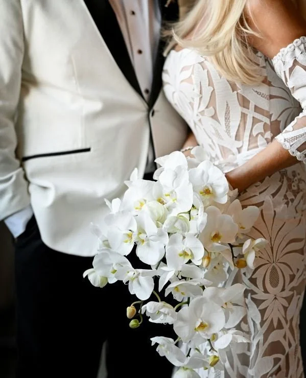 Nothing like a bouquet of white phalaenopsis orchids!⁠
⁠
Planning | @stylearchitectsweddings⁠
Venue | @urbandaisyevents⁠
Photography | @andrewvickphotography⁠
Content Creation | @candidandkate⁠
Catering | @damicohospitality⁠
Bar | @4liquidmotion⁠
Flo