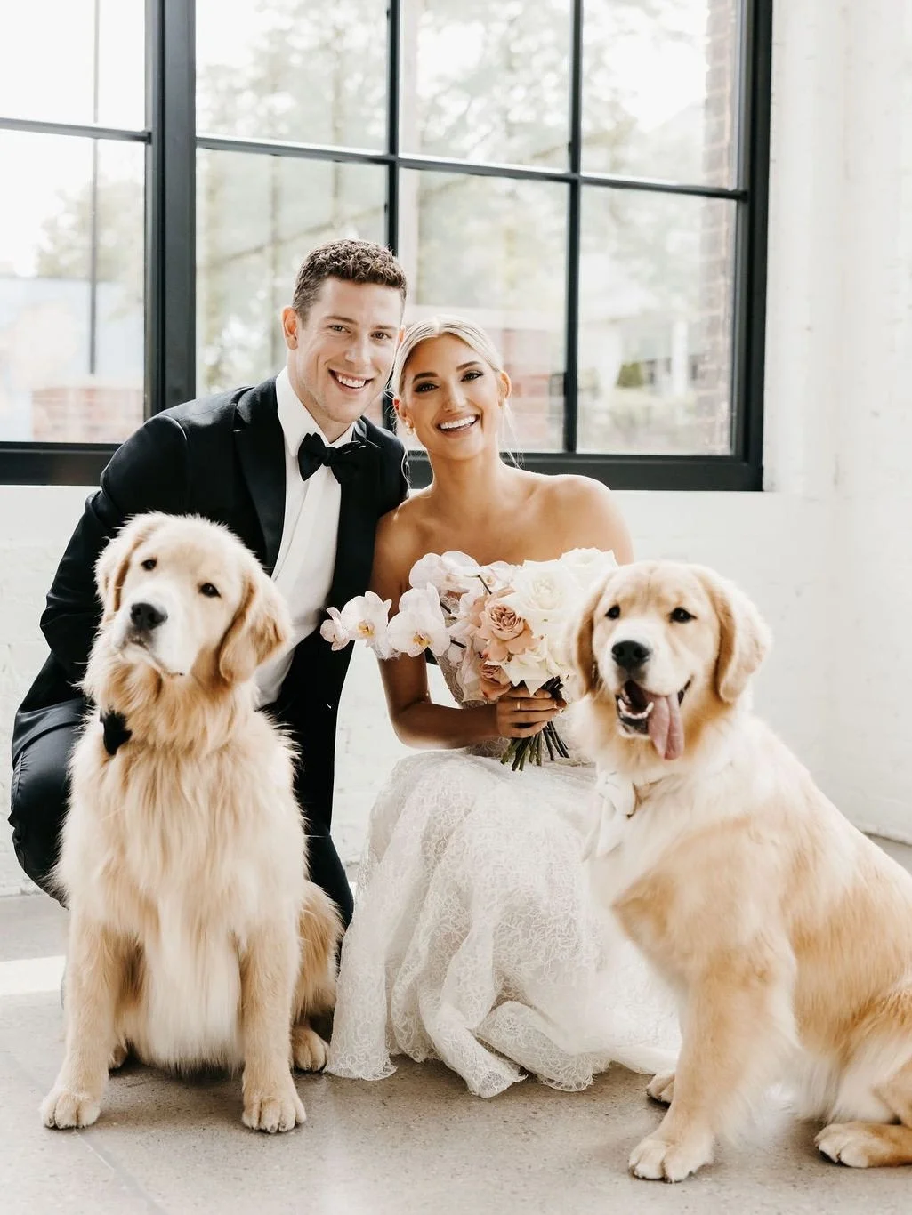 Some wedding guests are just a little better at posing than others. Happy National Dog Day to all the pups who have joined us down the aisle, in photos, and everywhere in between. Dogs are always welcome at our weddings.⁠
⁠