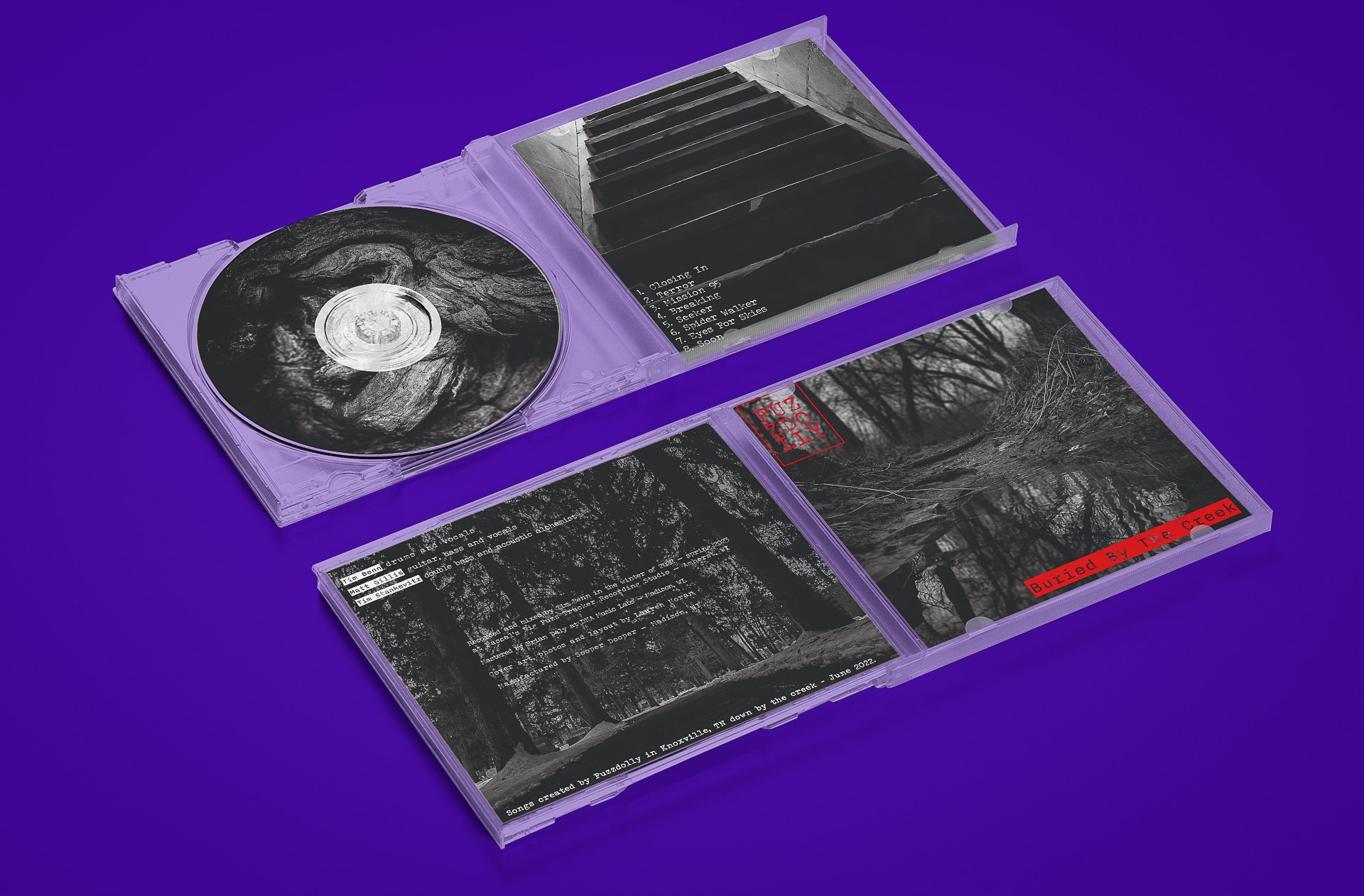 mockup-featuring-a-cd-and-two-boxes-placed-on-a-flat-surface-1029-el.jpg