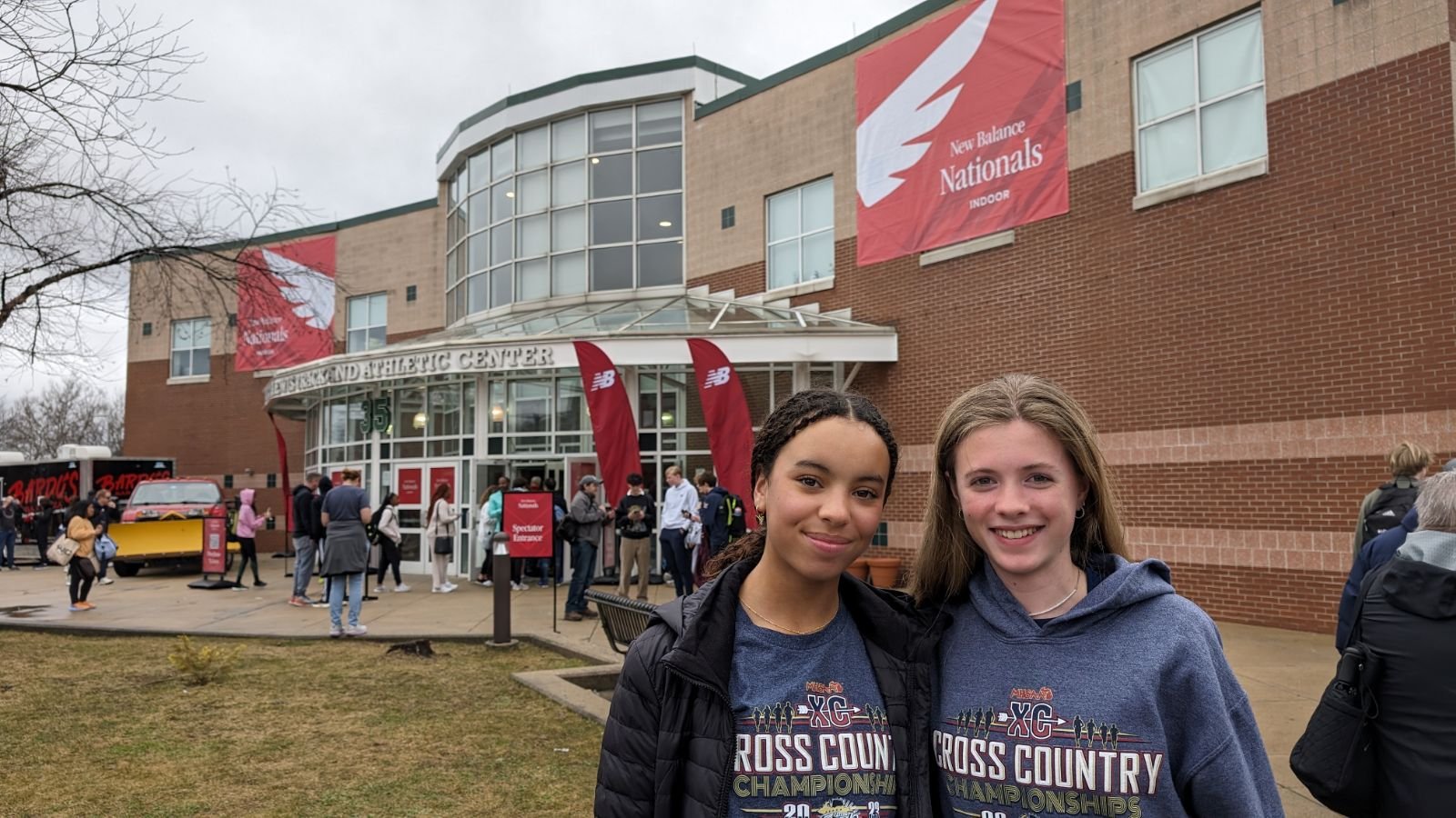 Two young runners outside New Balance nationals.