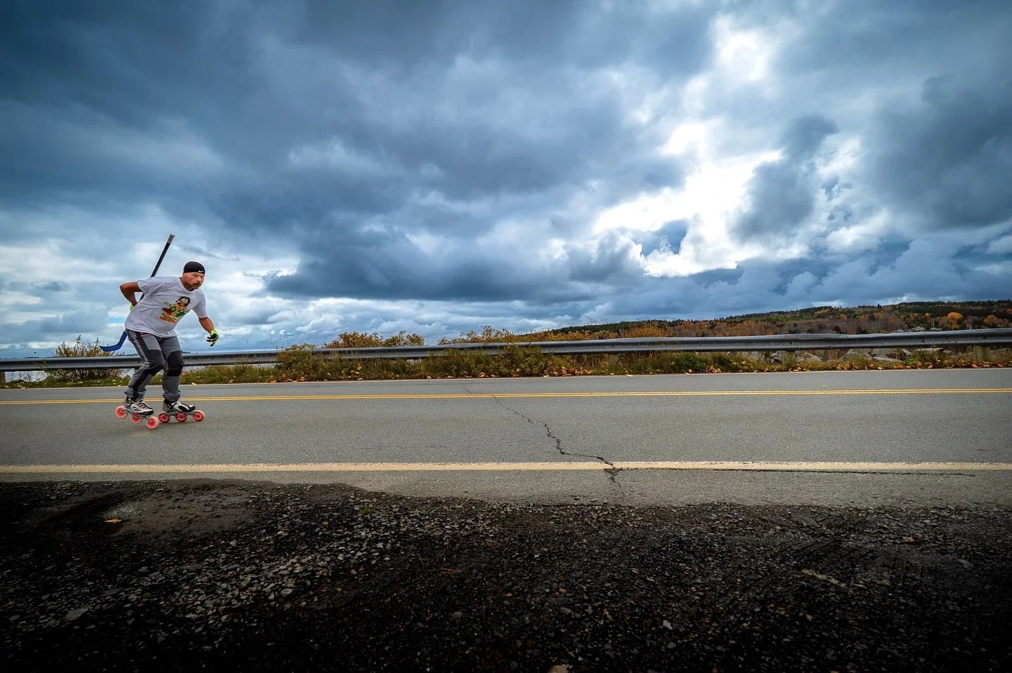 we were driving to catch the Lahave ferry we came up behind this guy screaming down the road on his inline skates, holding a hockey stick behind his back. It had been stormy all morning, the tail end of hurricane Melisa and the wind was still howling