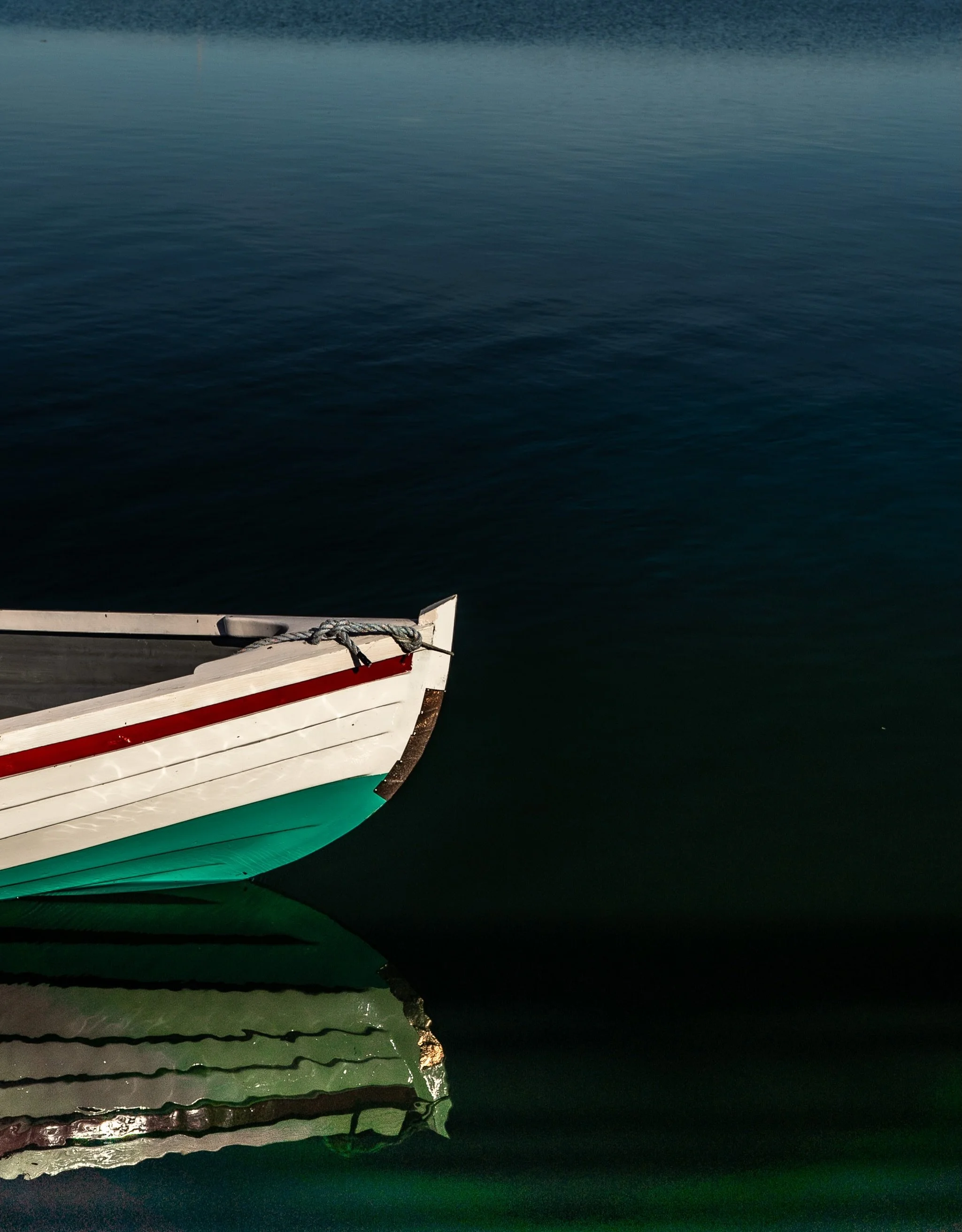 Skiff, reflecting in the evening sun.