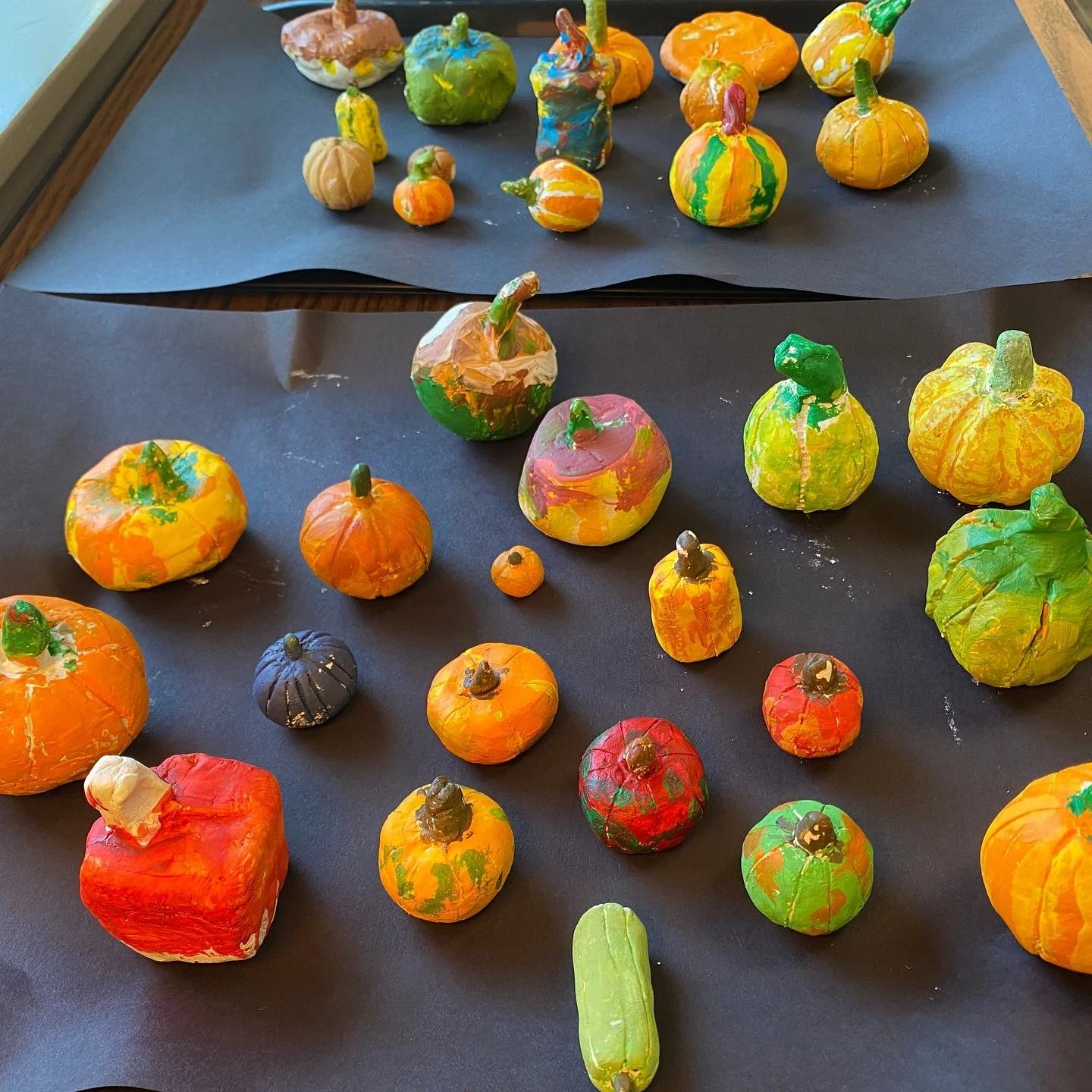 This fall students worked with air-dry clay to practice foundational hand-building techniques such as rolling a sphere, rolling a coil, and using the score-slip-smooth attachment method. 

I was floored by their attention to detail and quality of wor