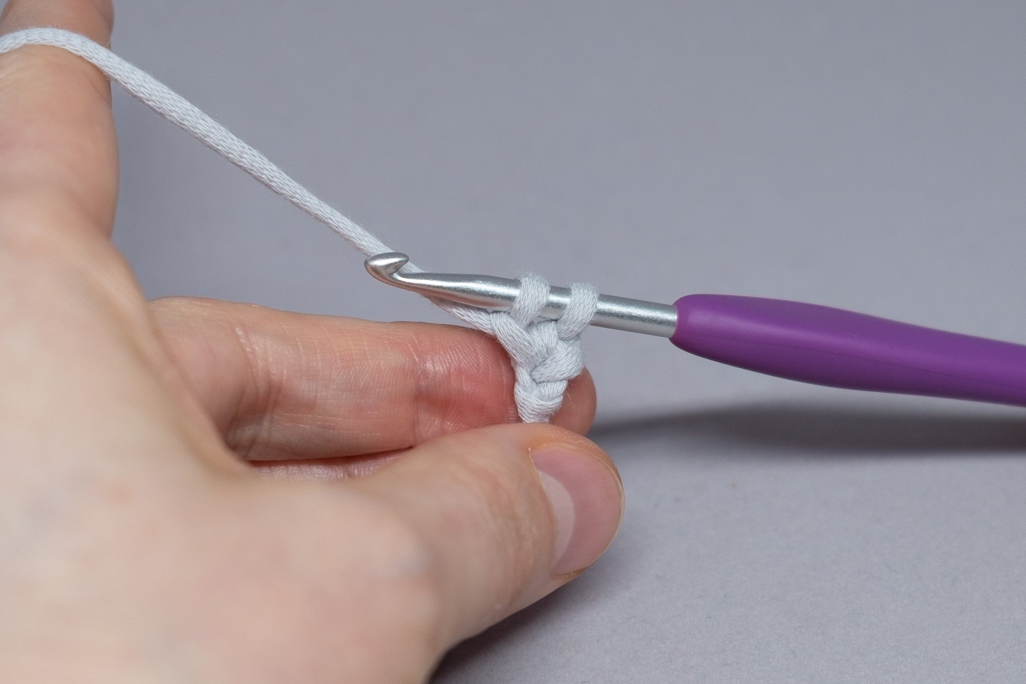  3. Yarn over and pull up through  only  the first loop on the hook. Your piece should look like this. 