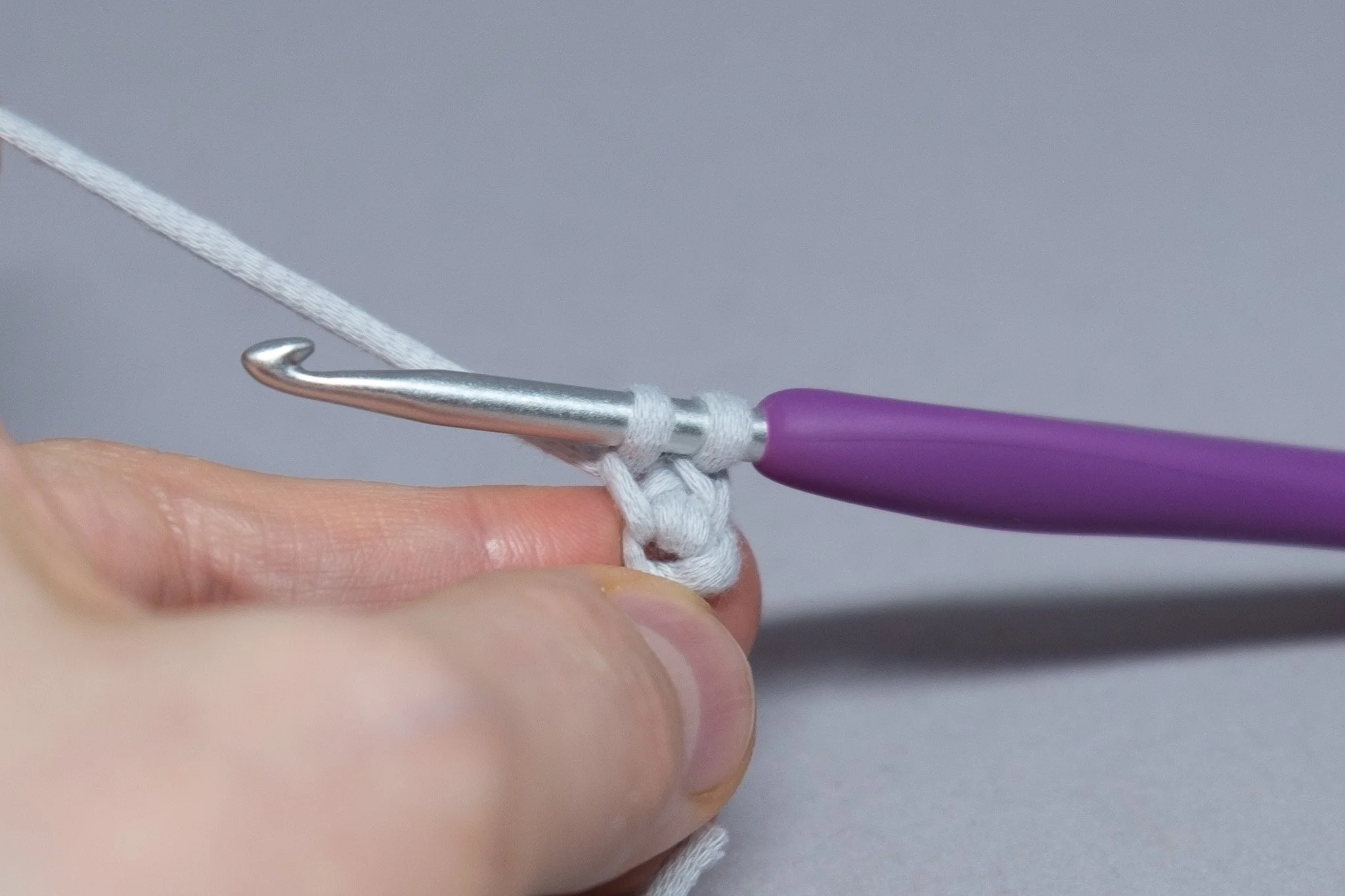  6. Yarn over and pull up a loop. 