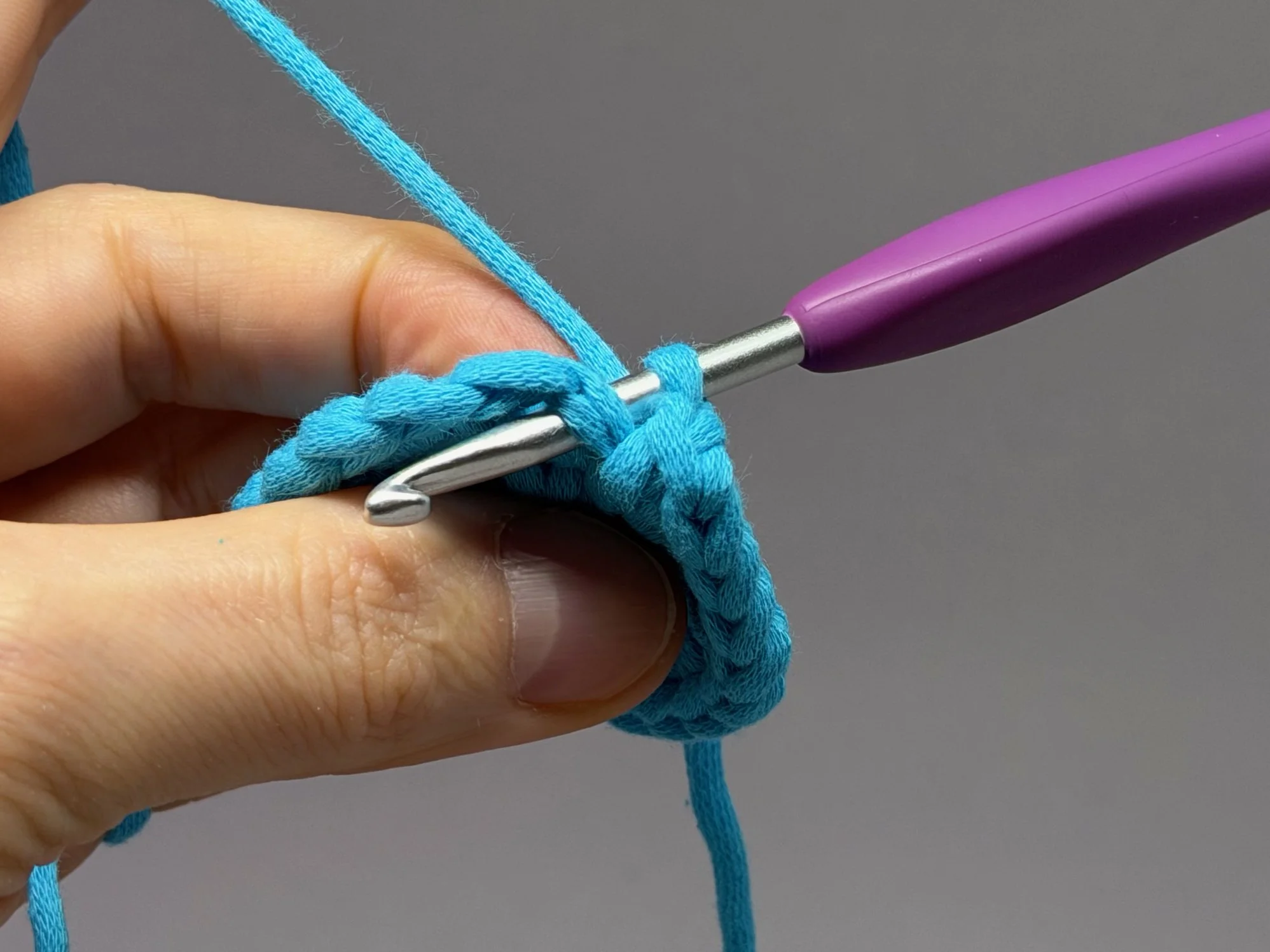  Insert your hook from the back of the piece to the front 