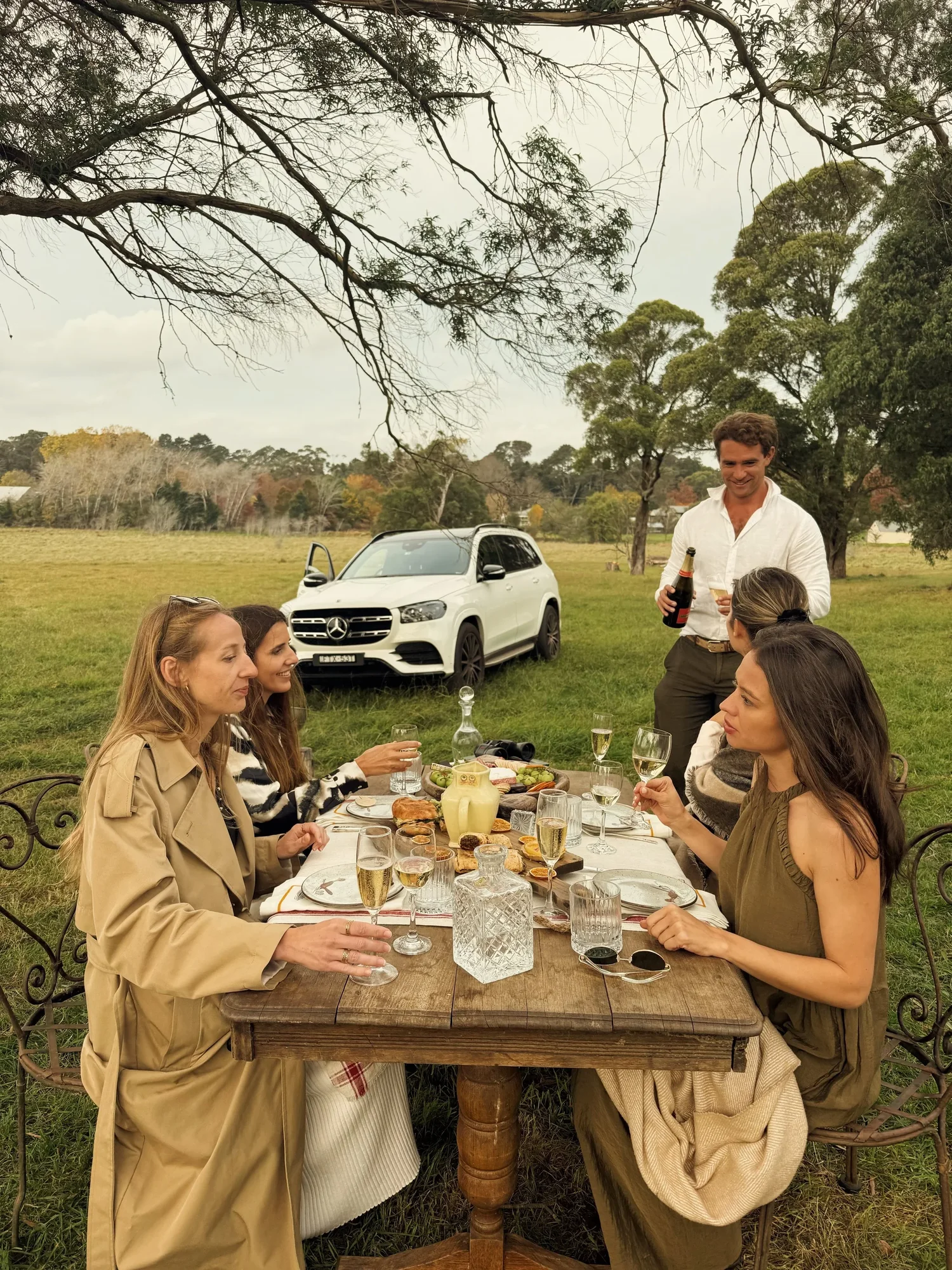 Cheese board, champagne and grazing boards laid out for an afternoon spread at Boscobel Estate, Southern Highlands NSW