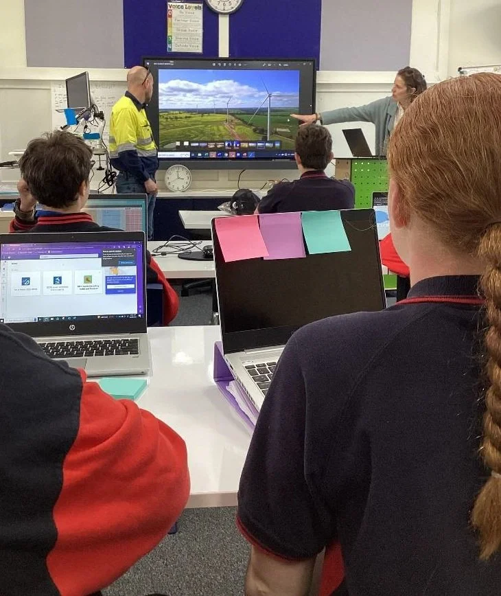 Presenting to school students on windfarm