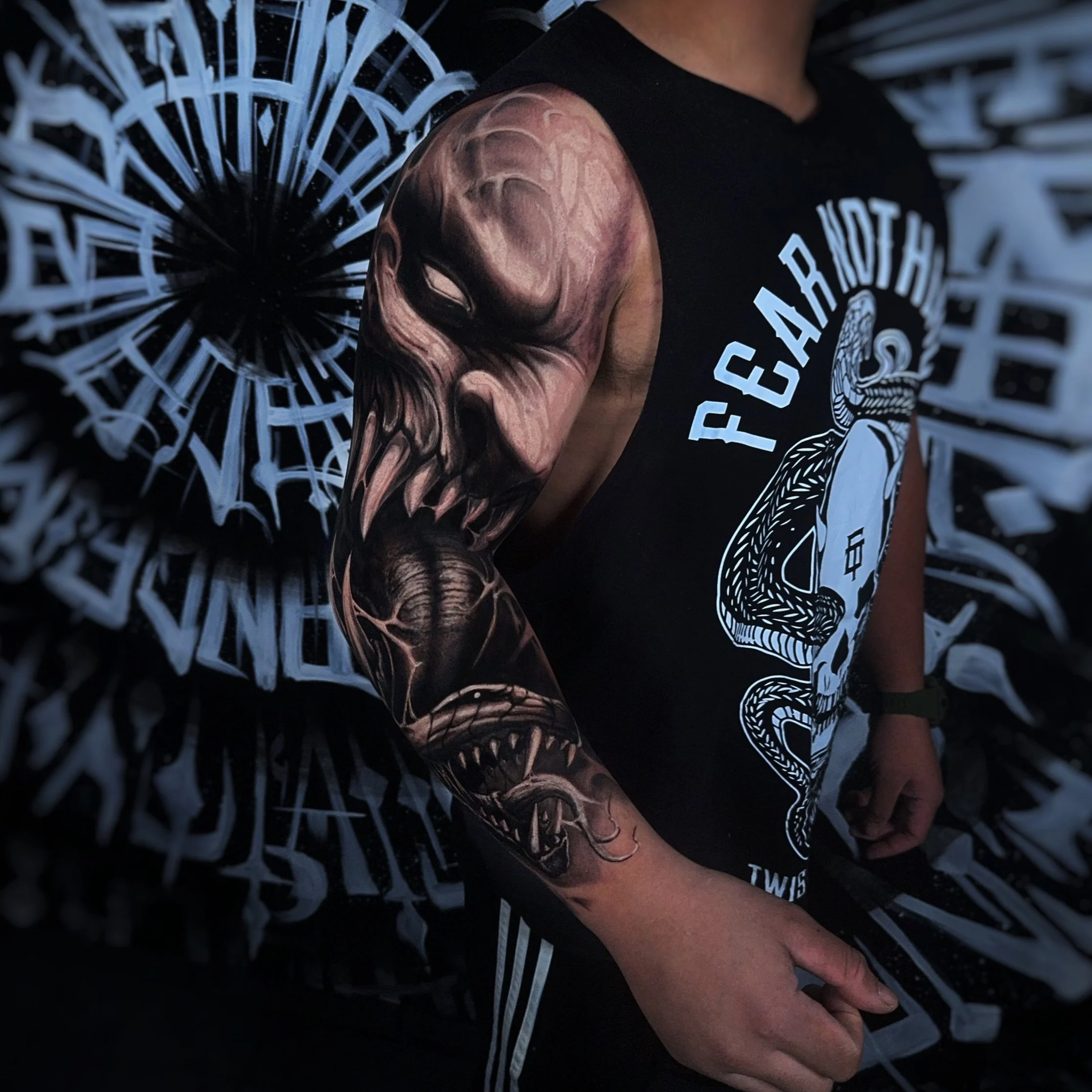 Dark style full arm sleeve tattoo