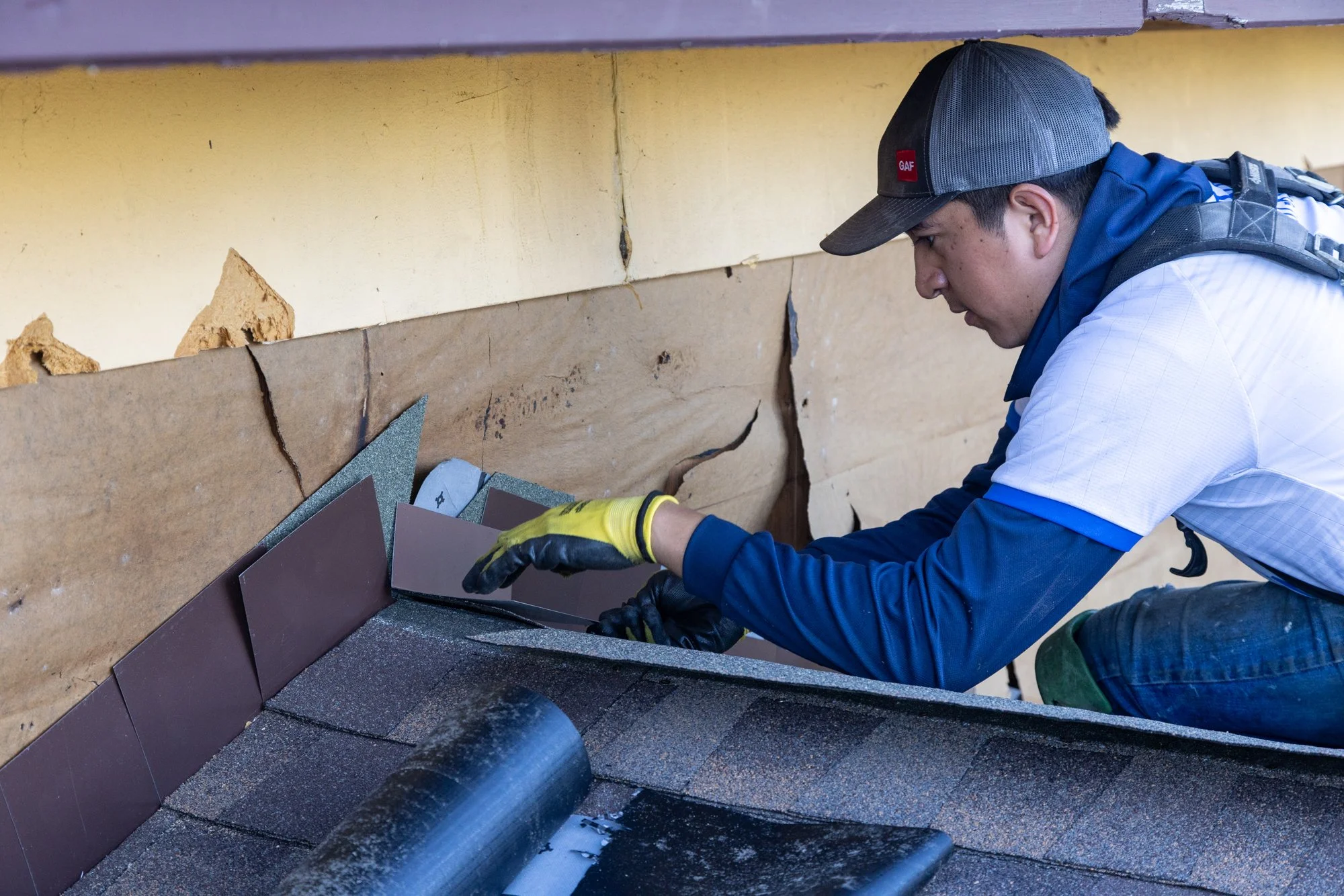 Step shingles are used whenever a wall meets the roofline