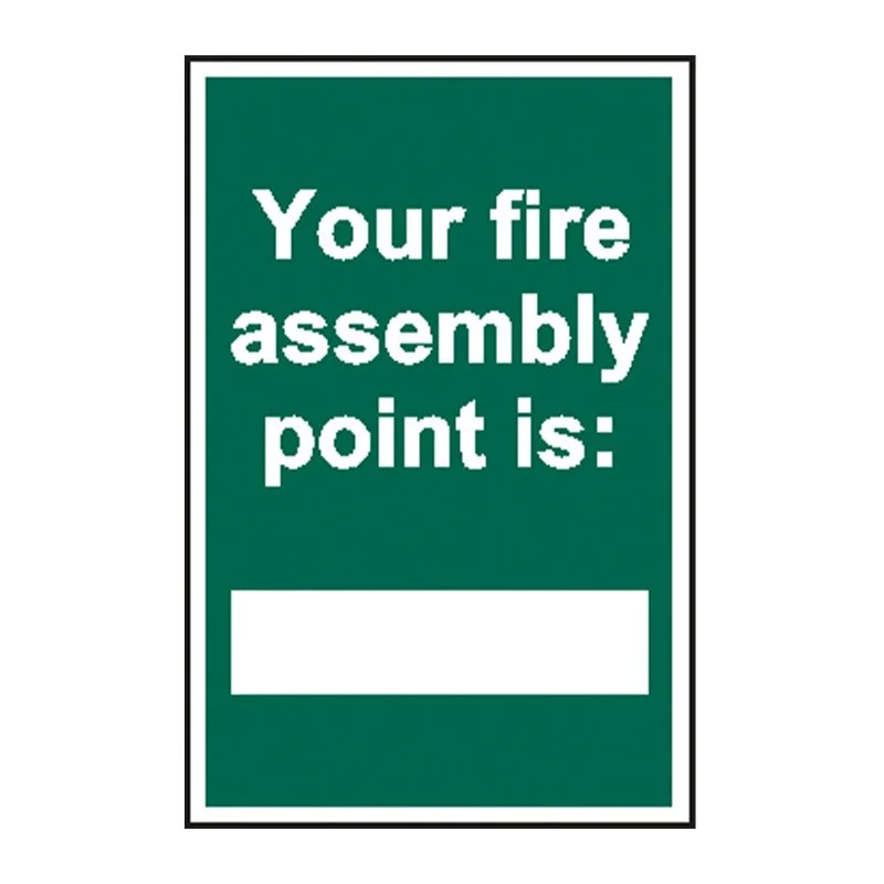 Fire safety sign stating, 'Your fire assembly point is:' with an empty space below for writing the specific location.