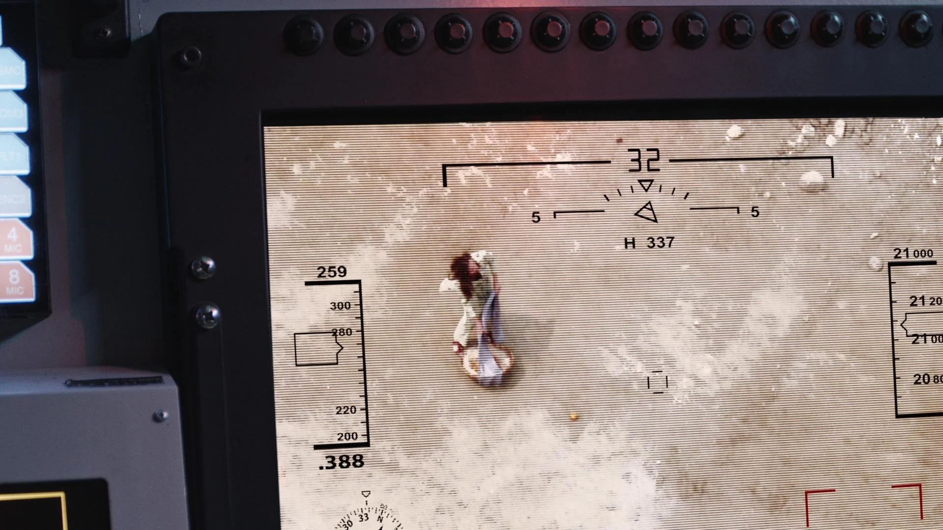 Aircraft cockpit display screen showing an aerial view with altitude, heading, and speed data, featuring a small person figure in the scene.