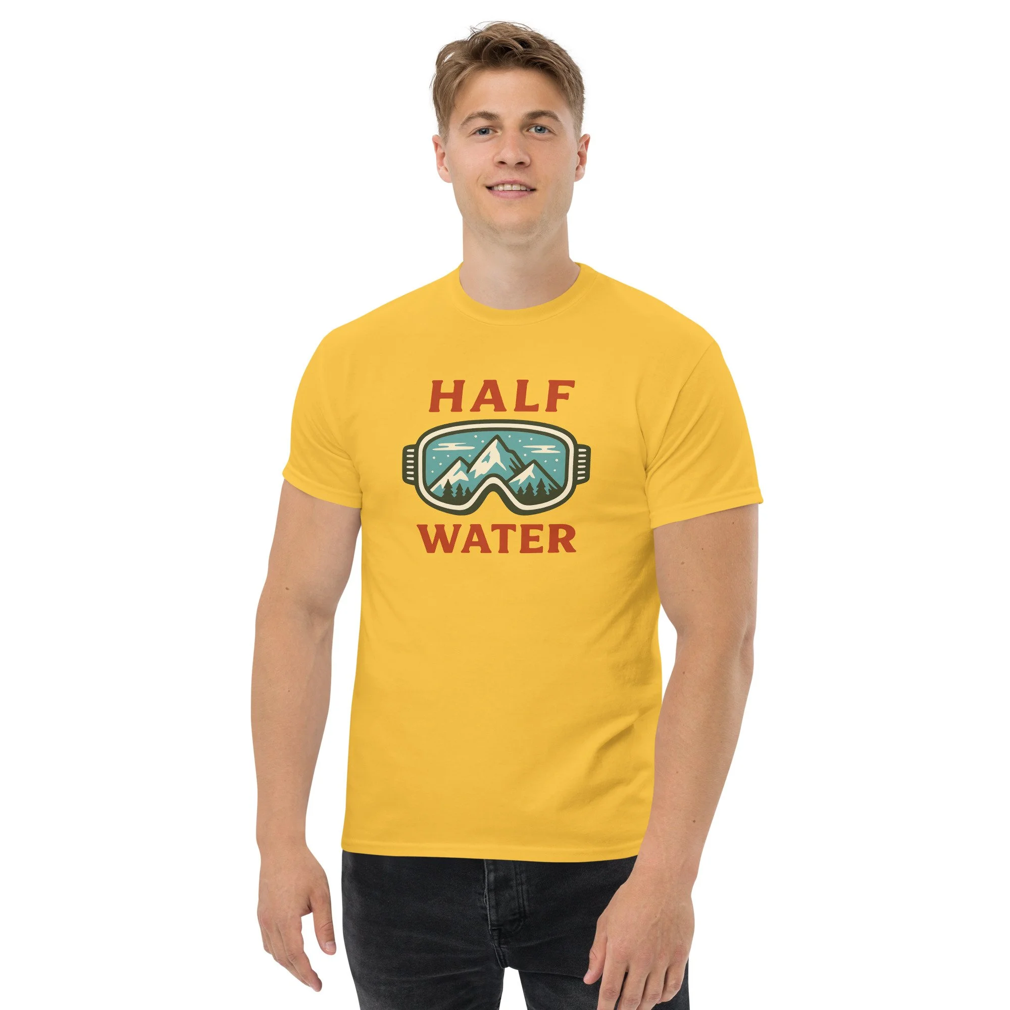 Young man in yellow t-shirt with mountain and water graphic, and the text 'Half Water'